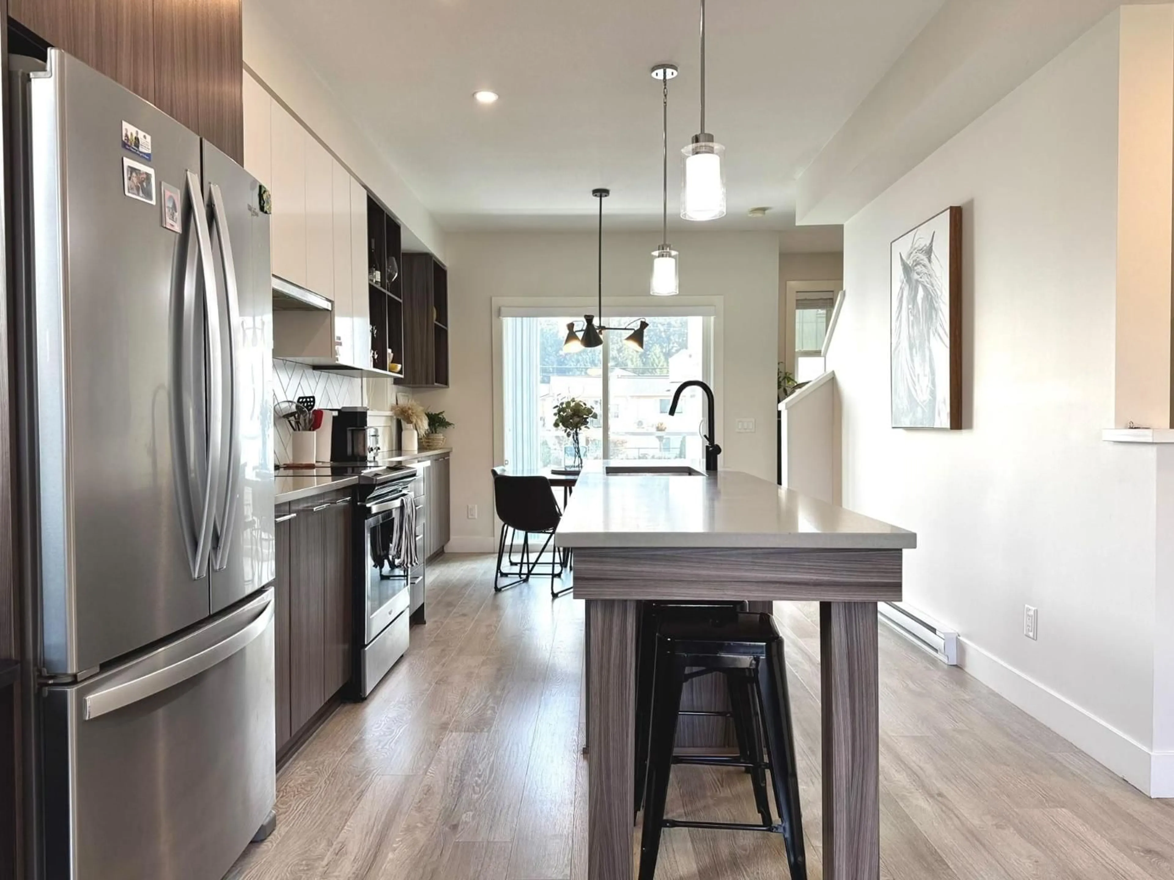 Open concept kitchen, wood/laminate floor for 16 - 2505 WARE STREET, Abbotsford British Columbia V2S0K3