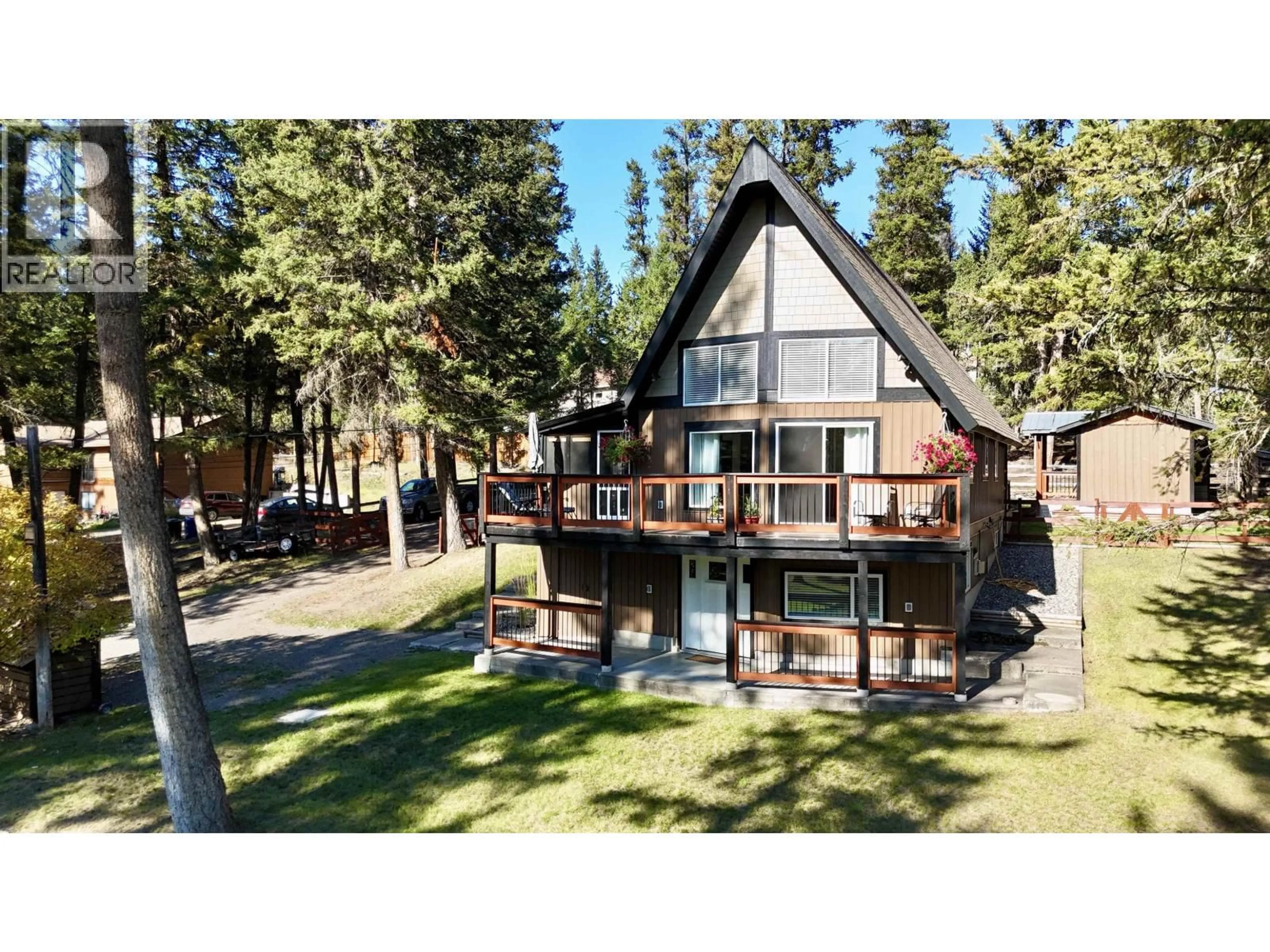 A pic from outside/outdoor area/front of a property/back of a property/a pic from drone, unknown for 4867 GLOINNZUN DRIVE, 108 Mile Ranch British Columbia V0K2Z0