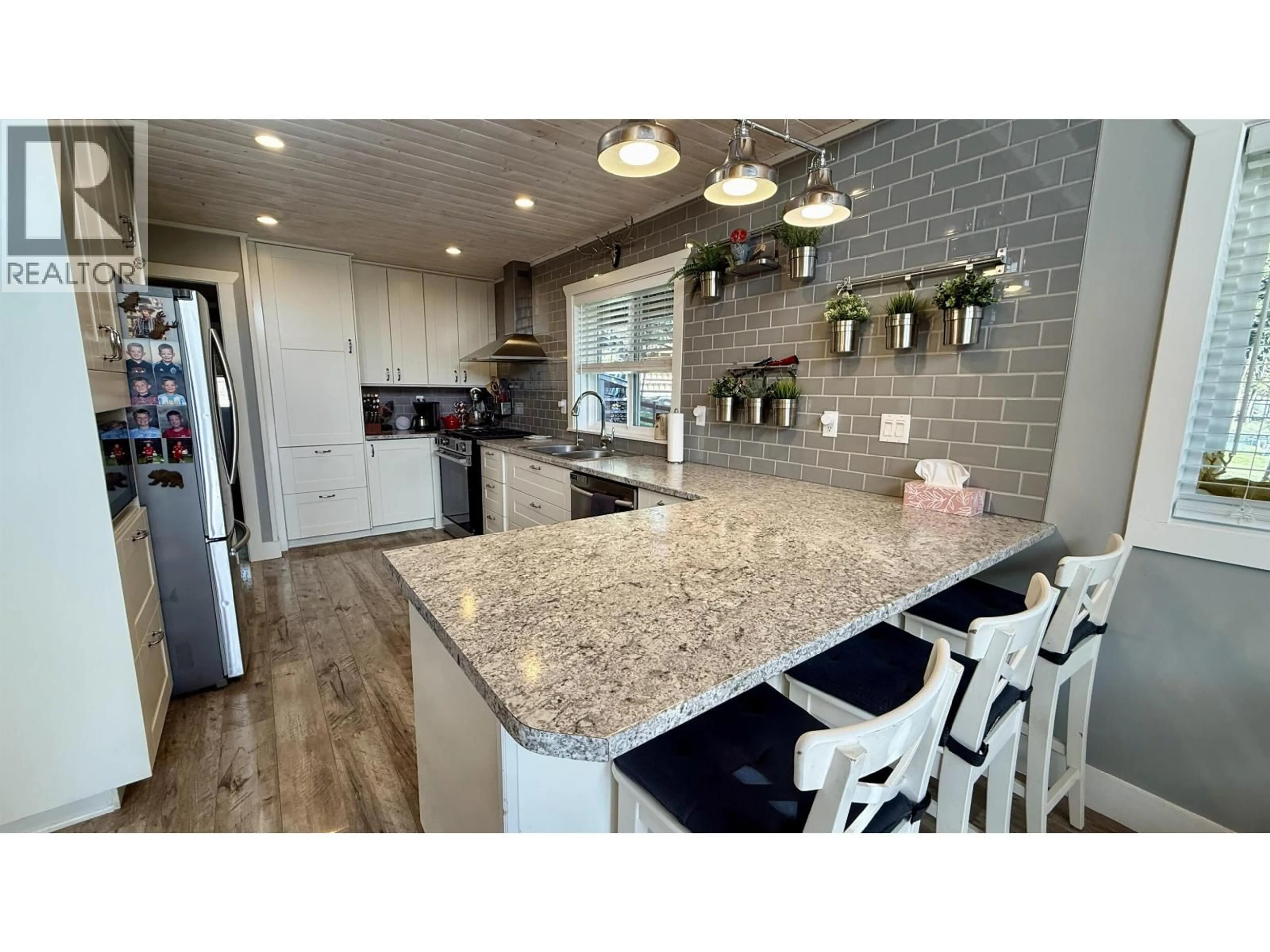 Open concept kitchen, ceramic/tile floor for 4867 GLOINNZUN DRIVE, 108 Mile Ranch British Columbia V0K2Z0