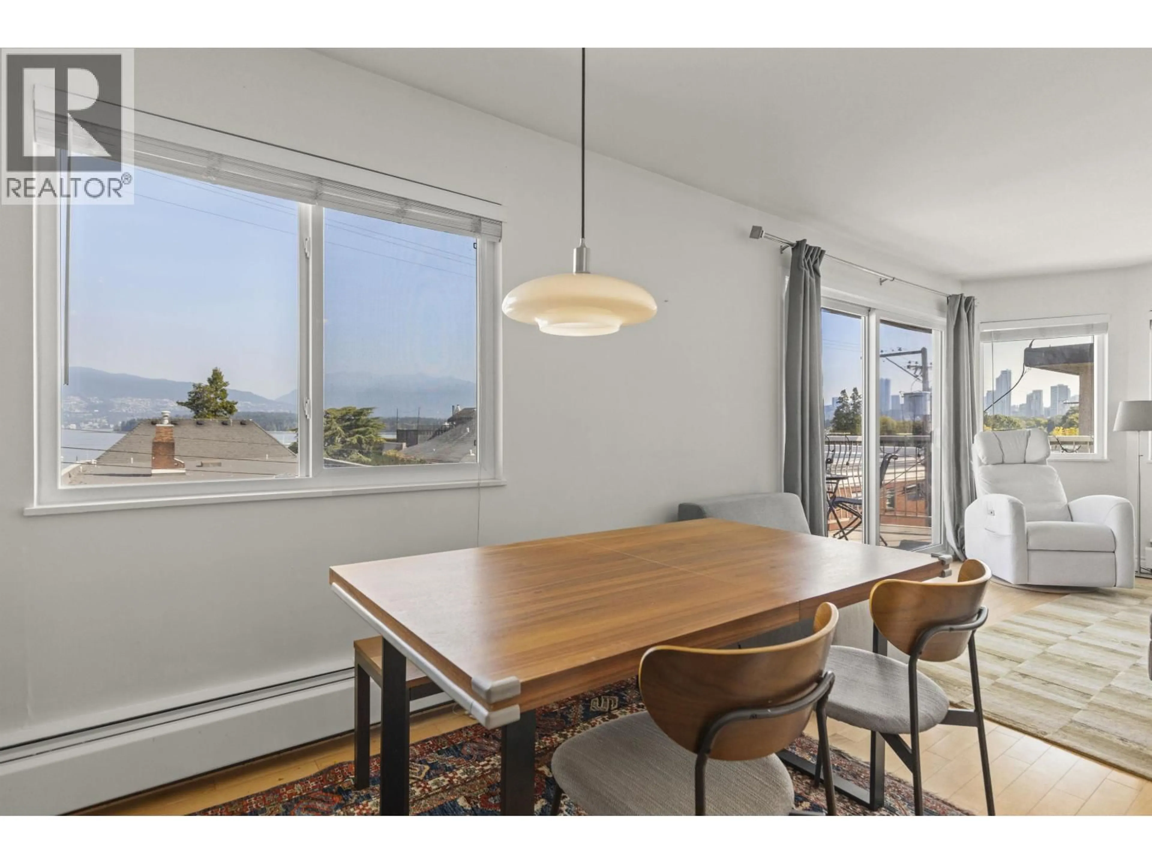 Dining room, wood/laminate floor for 307 - 2335 YORK AVENUE, Vancouver British Columbia V6K1C8