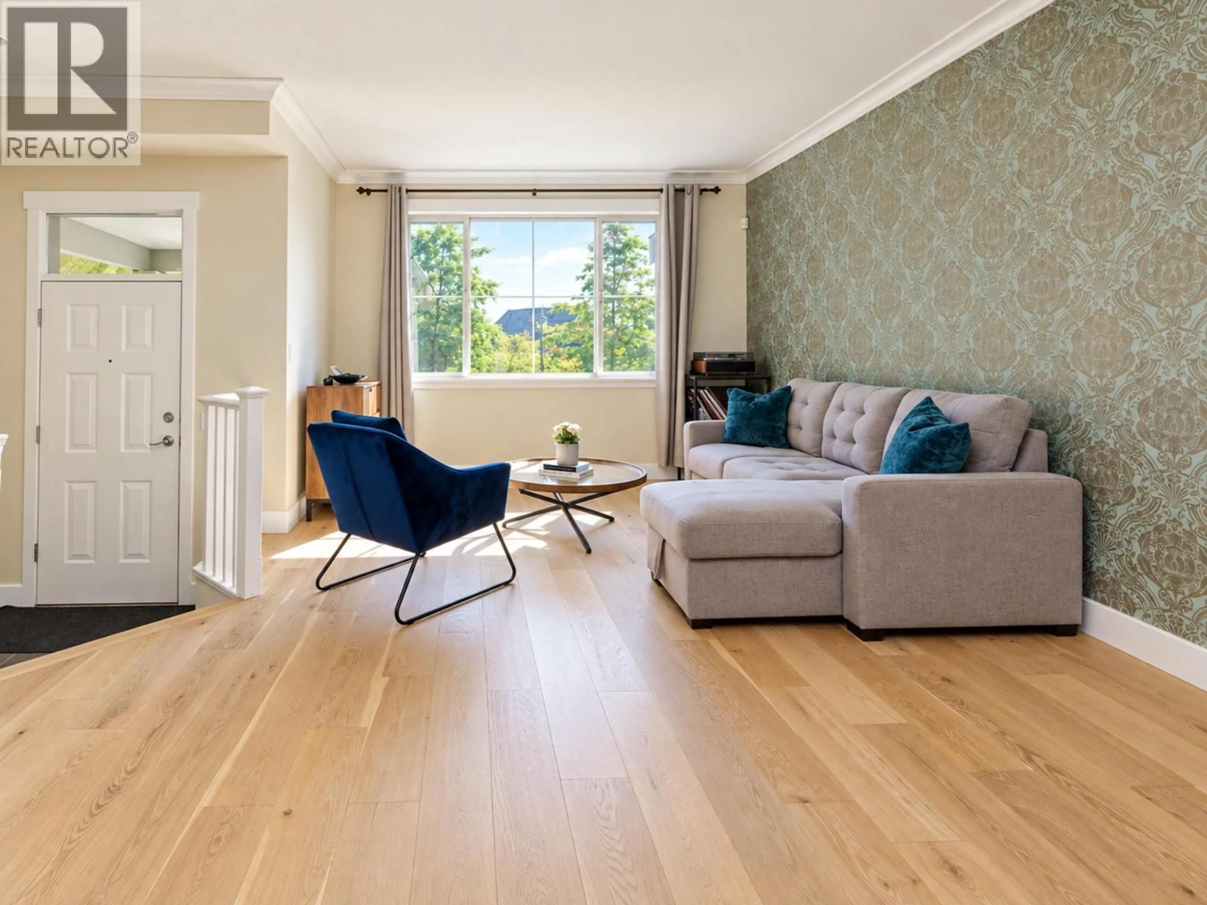 Living room with furniture, wood/laminate floor for 167 FERNWAY DRIVE, Port Moody British Columbia V3H5M1
