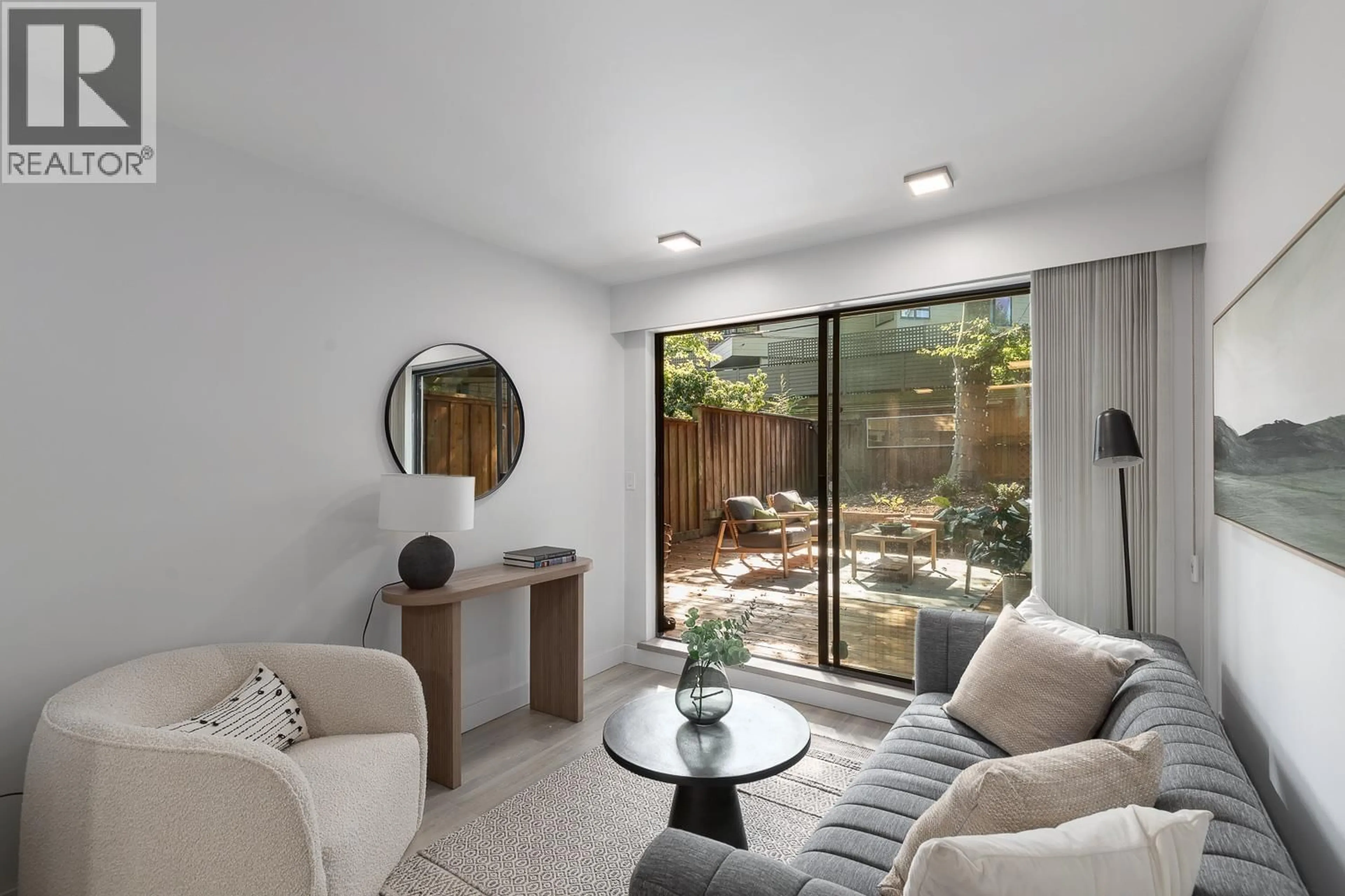 Living room with furniture, unknown for 207 - 2410 CORNWALL AVENUE, Vancouver British Columbia V6K1B8