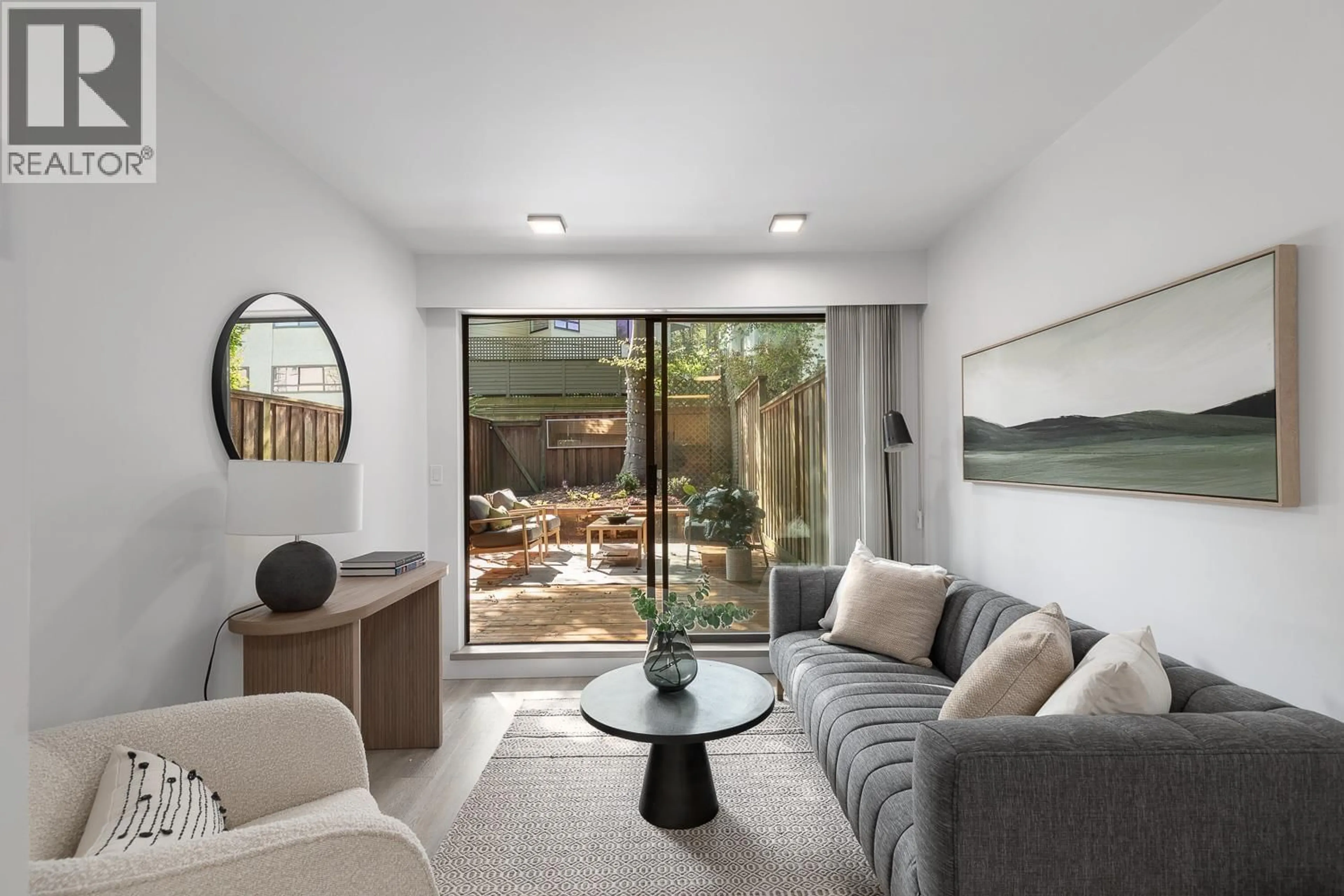 Living room with furniture, unknown for 207 - 2410 CORNWALL AVENUE, Vancouver British Columbia V6K1B8