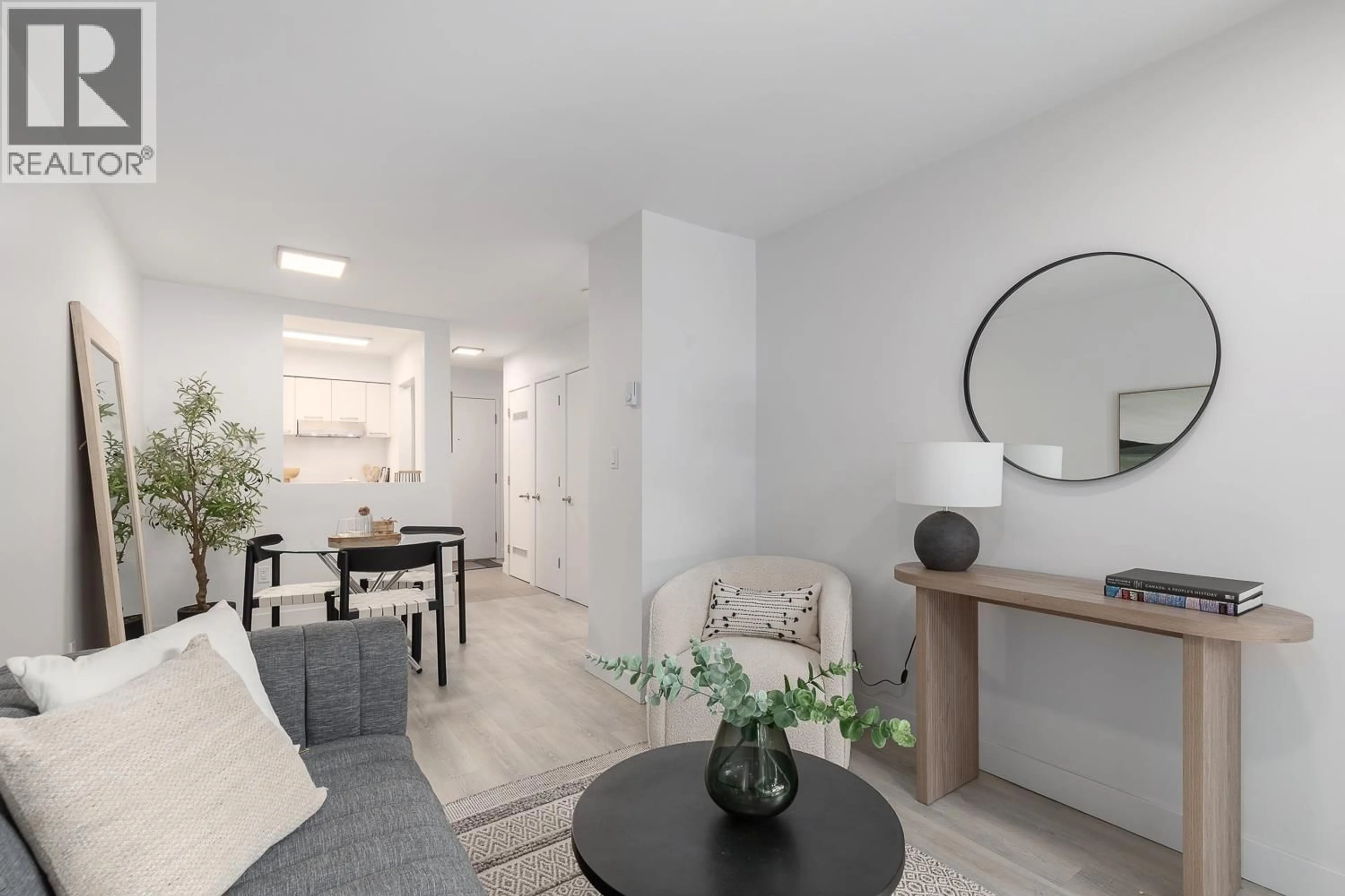 Living room with furniture, unknown for 207 - 2410 CORNWALL AVENUE, Vancouver British Columbia V6K1B8