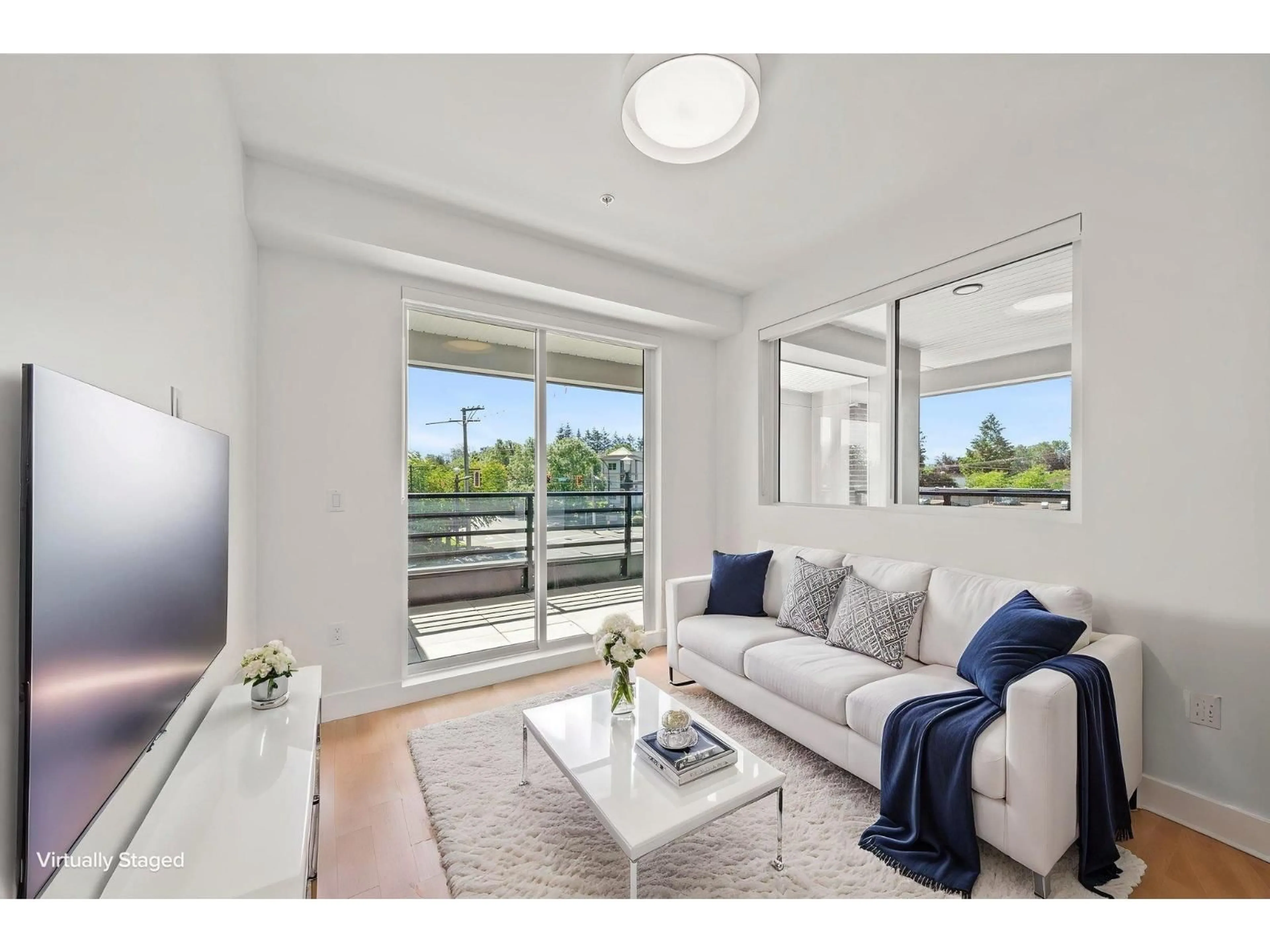 Living room with furniture, wood/laminate floor for 439 - 20769 FRASER HIGHWAY, Langley British Columbia V3A4G4