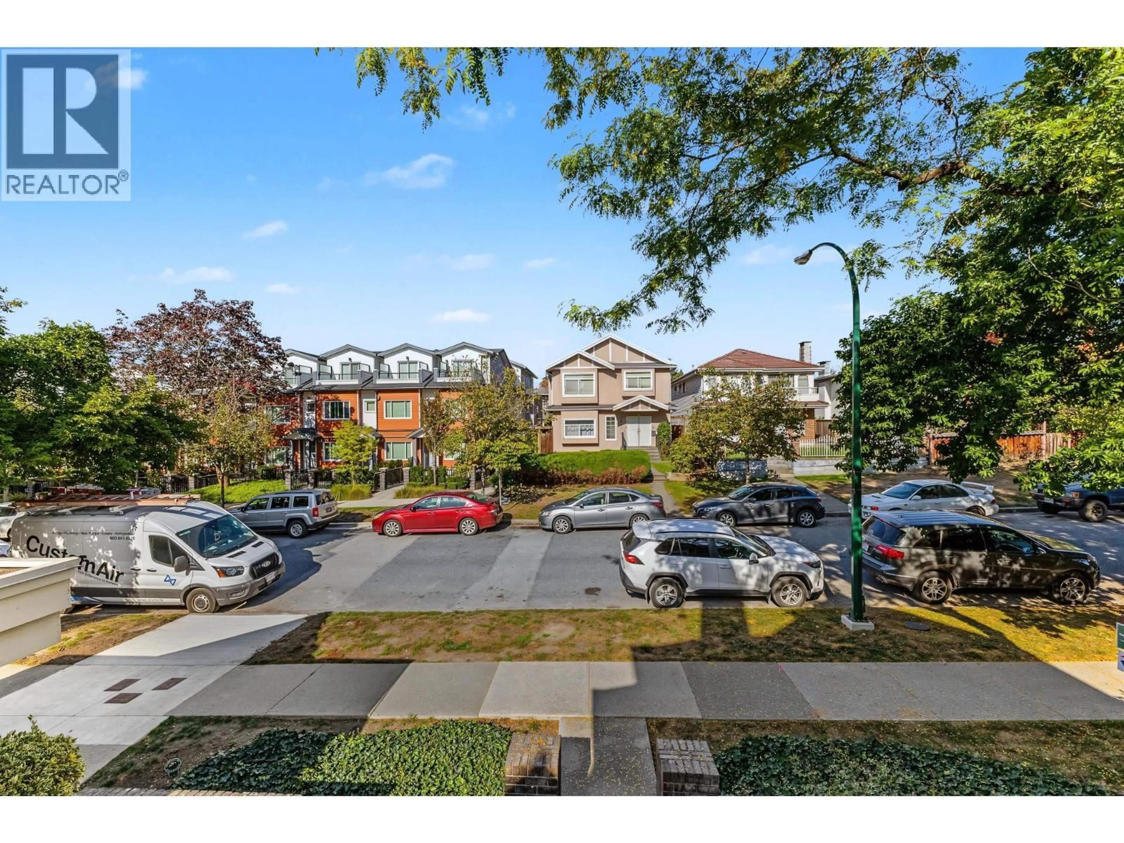 A pic from outside/outdoor area/front of a property/back of a property/a pic from drone, street for 302 - 3638 RAE AVENUE, Vancouver British Columbia V5R2P5