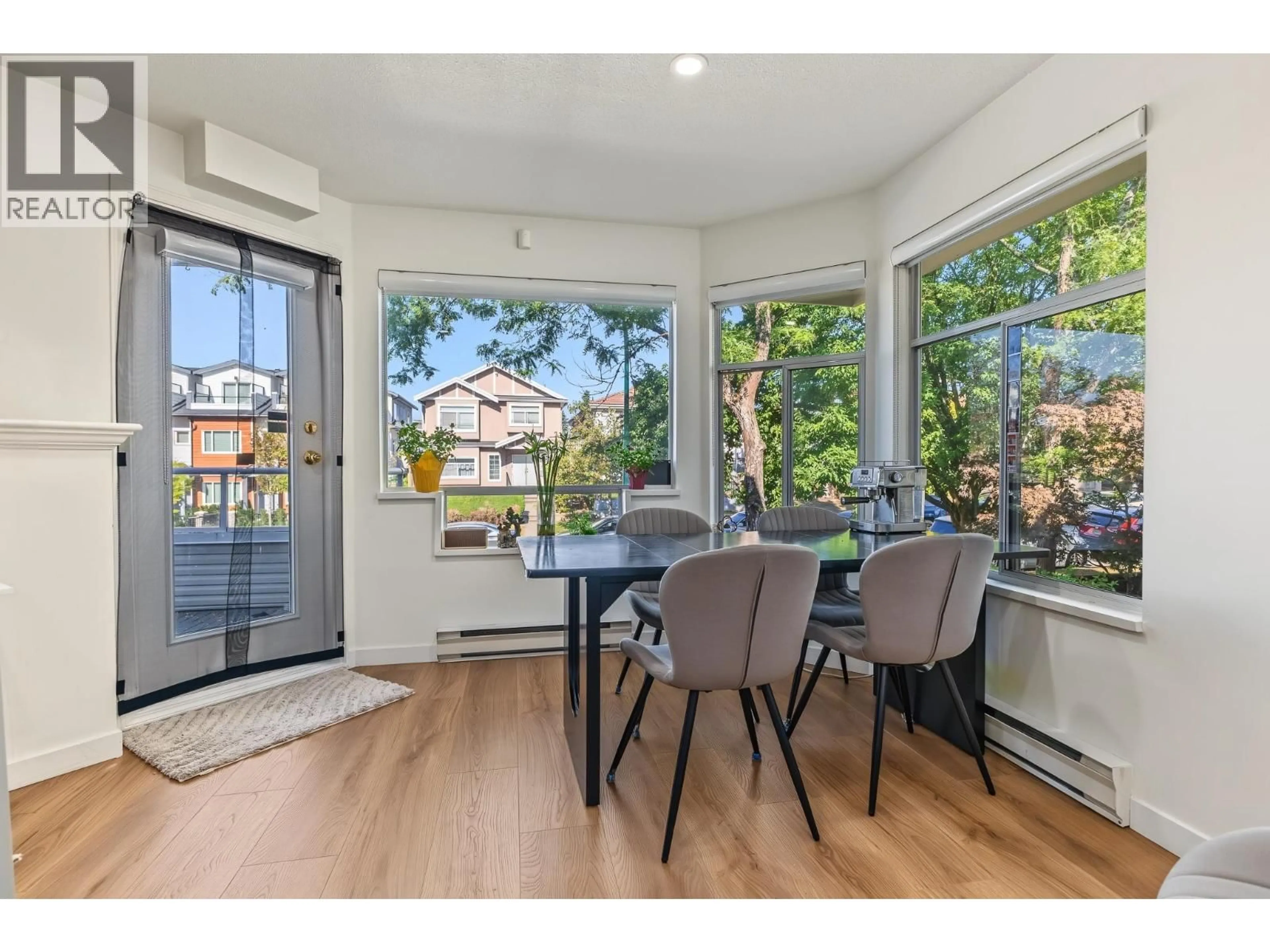 Dining room, wood/laminate floor for 302 - 3638 RAE AVENUE, Vancouver British Columbia V5R2P5