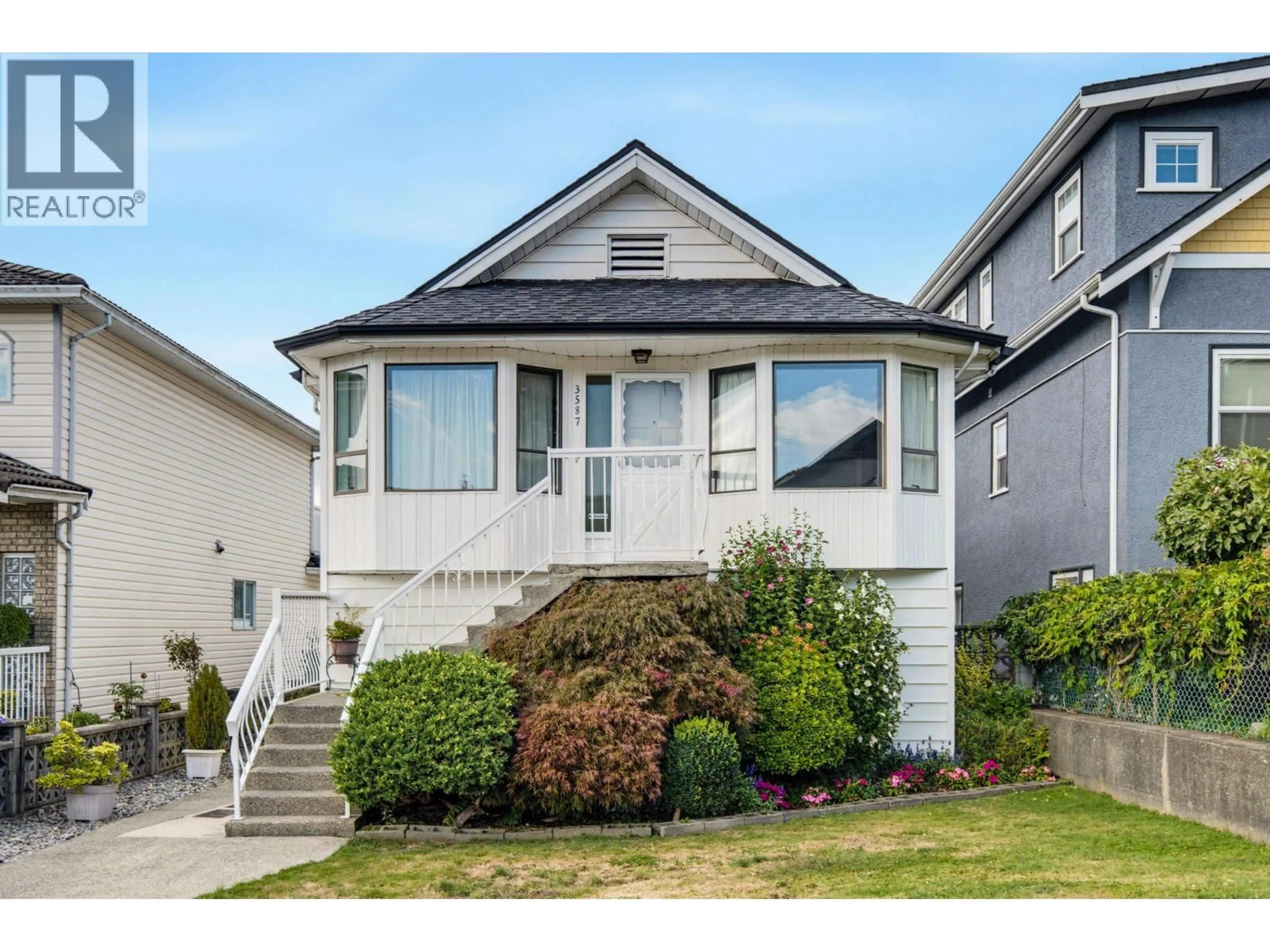 Home with vinyl exterior material, street for 3587 TRIUMPH STREET, Vancouver British Columbia V5K1V2