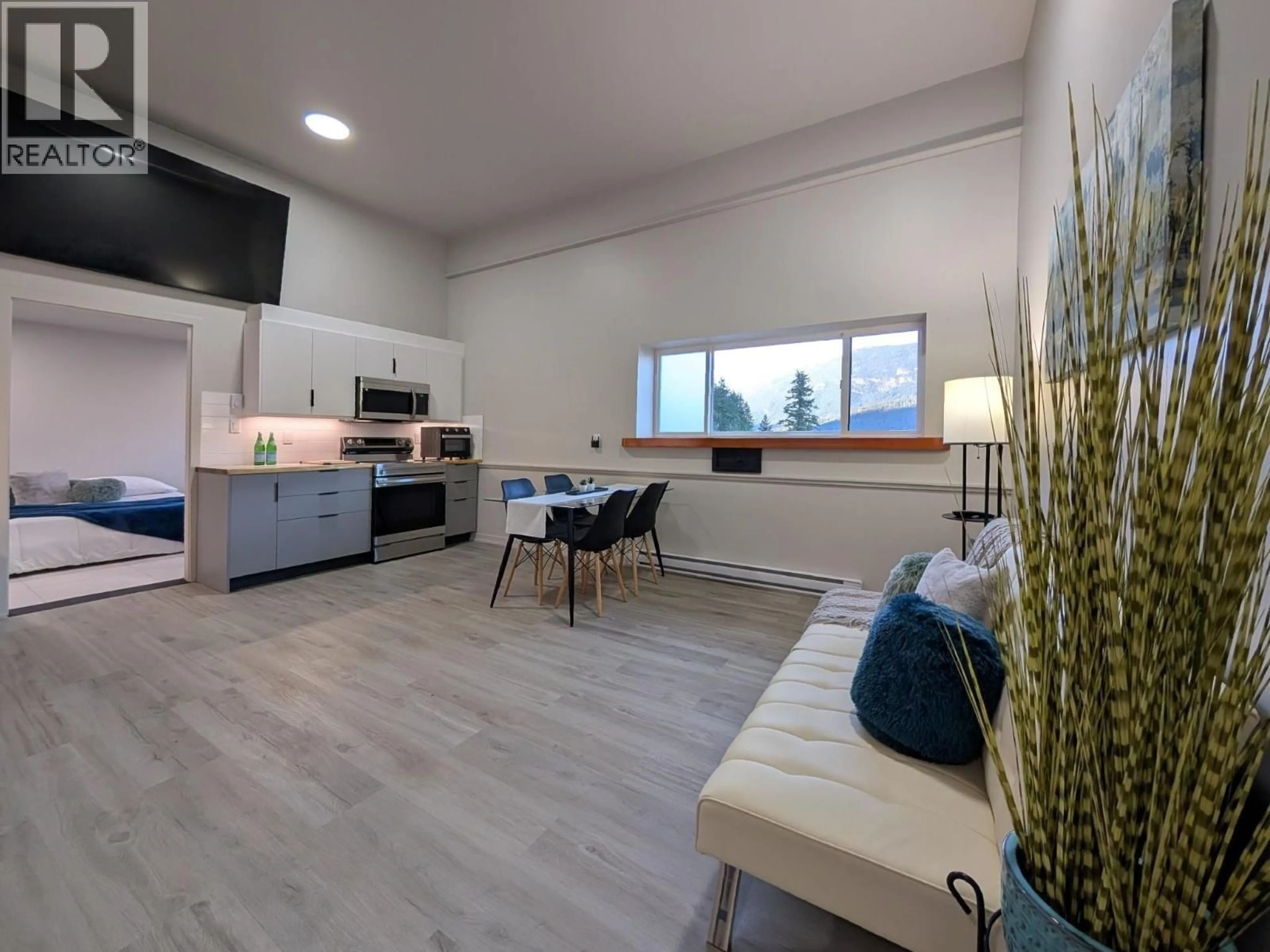 Open concept kitchen, wood/laminate floor for 3 - 1307 EAGLE DRIVE, Pemberton British Columbia V0N2L0