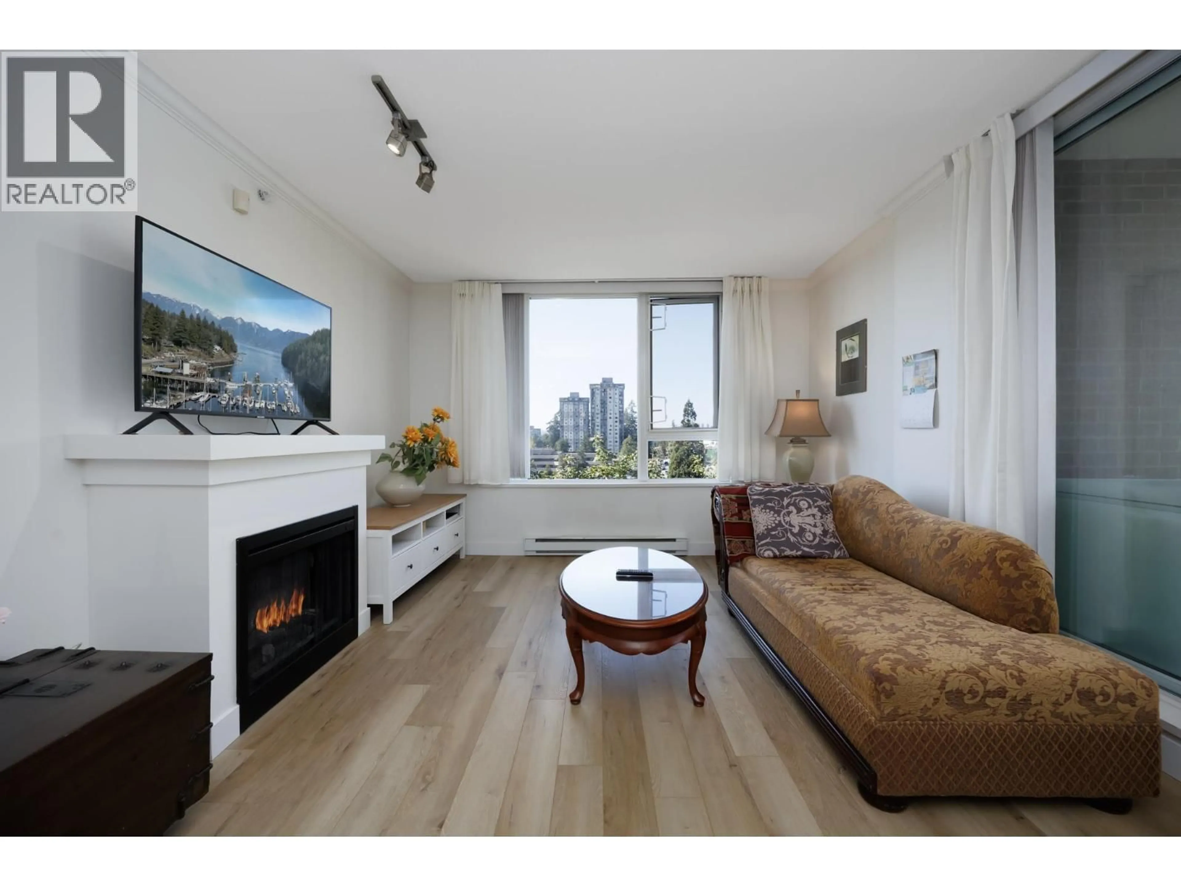 Living room with furniture, wood/laminate floor for 305 - 9868 CAMERON STREET, Burnaby British Columbia V5J0A5