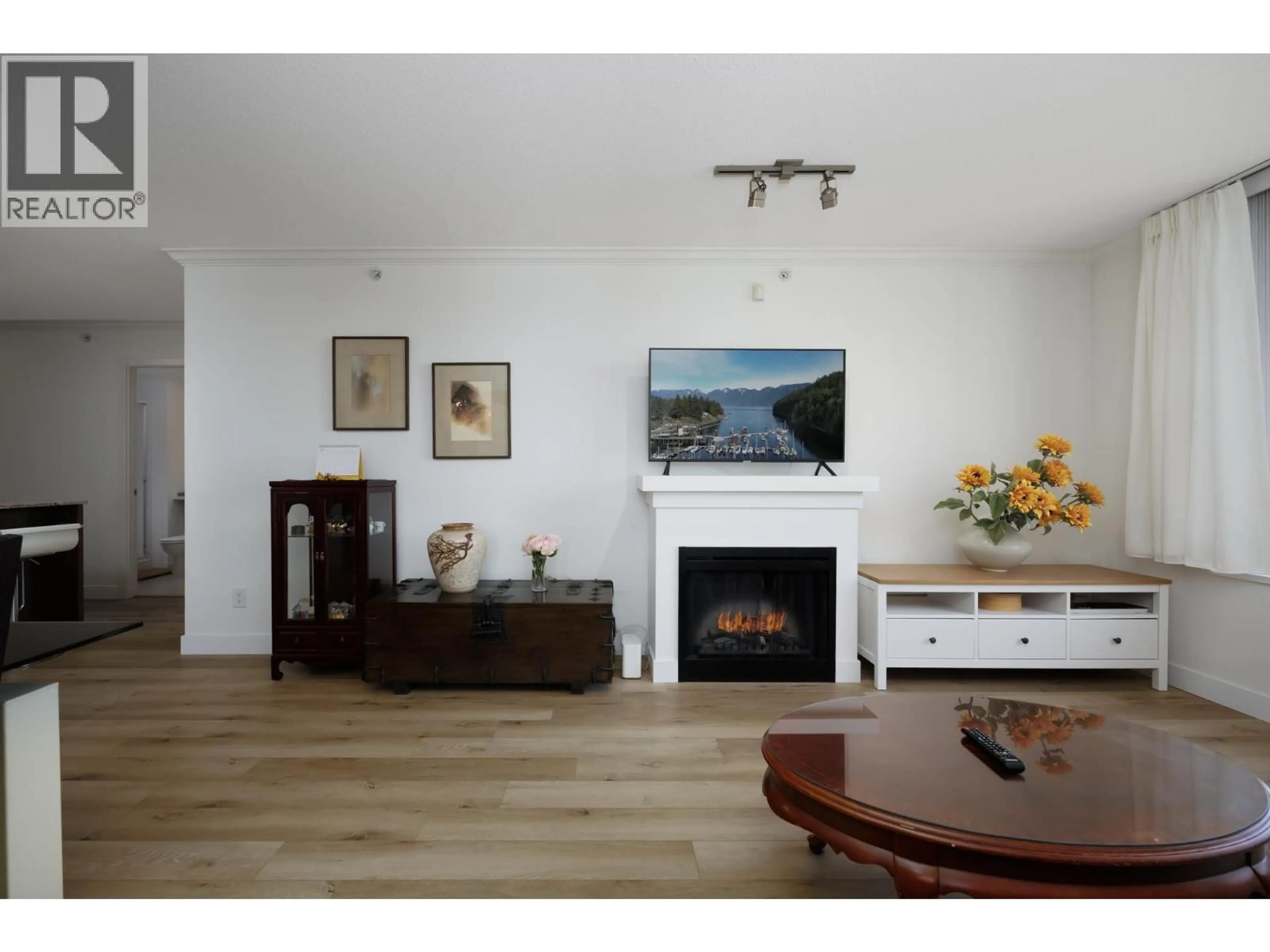 Living room with furniture, wood/laminate floor for 305 - 9868 CAMERON STREET, Burnaby British Columbia V5J0A5