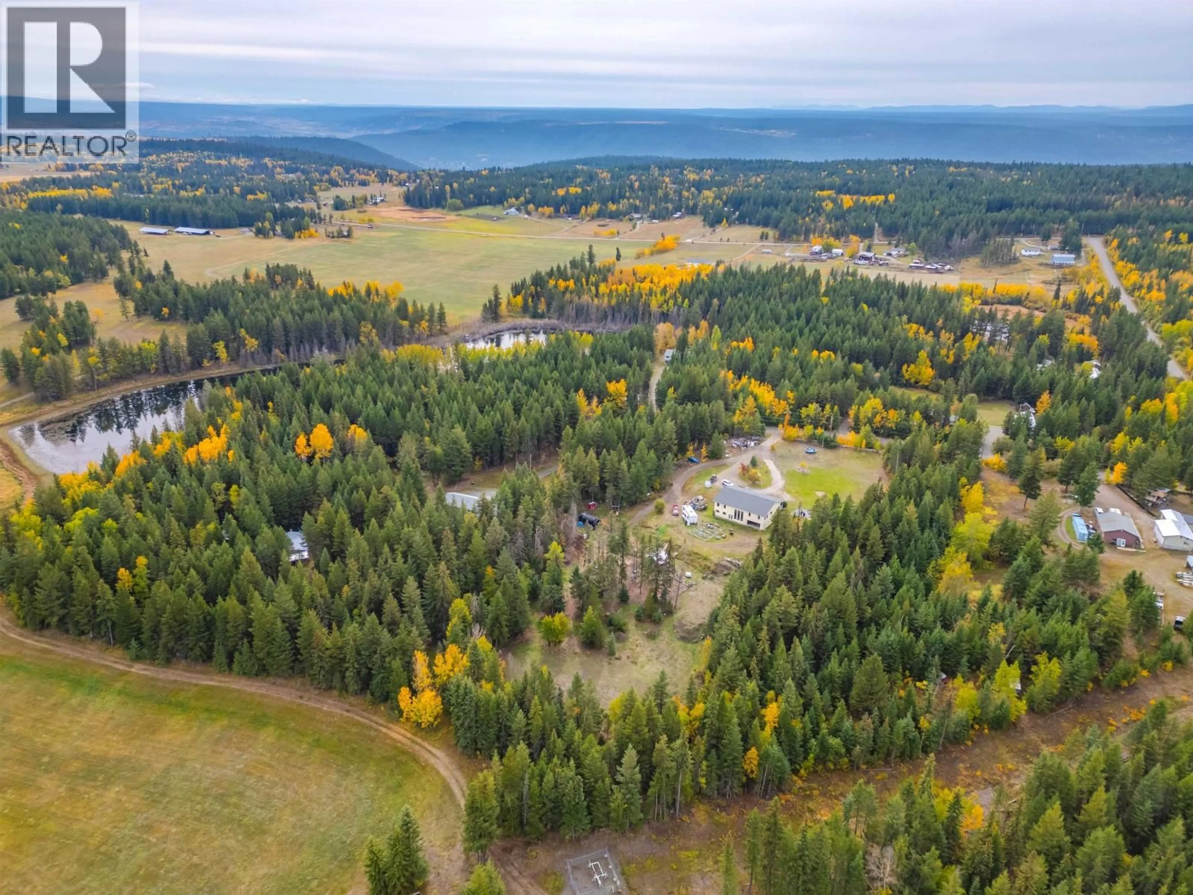 A pic from outside/outdoor area/front of a property/back of a property/a pic from drone, forest/trees view for 1761 KOPEKA PLACE, Williams Lake British Columbia V2G5B4