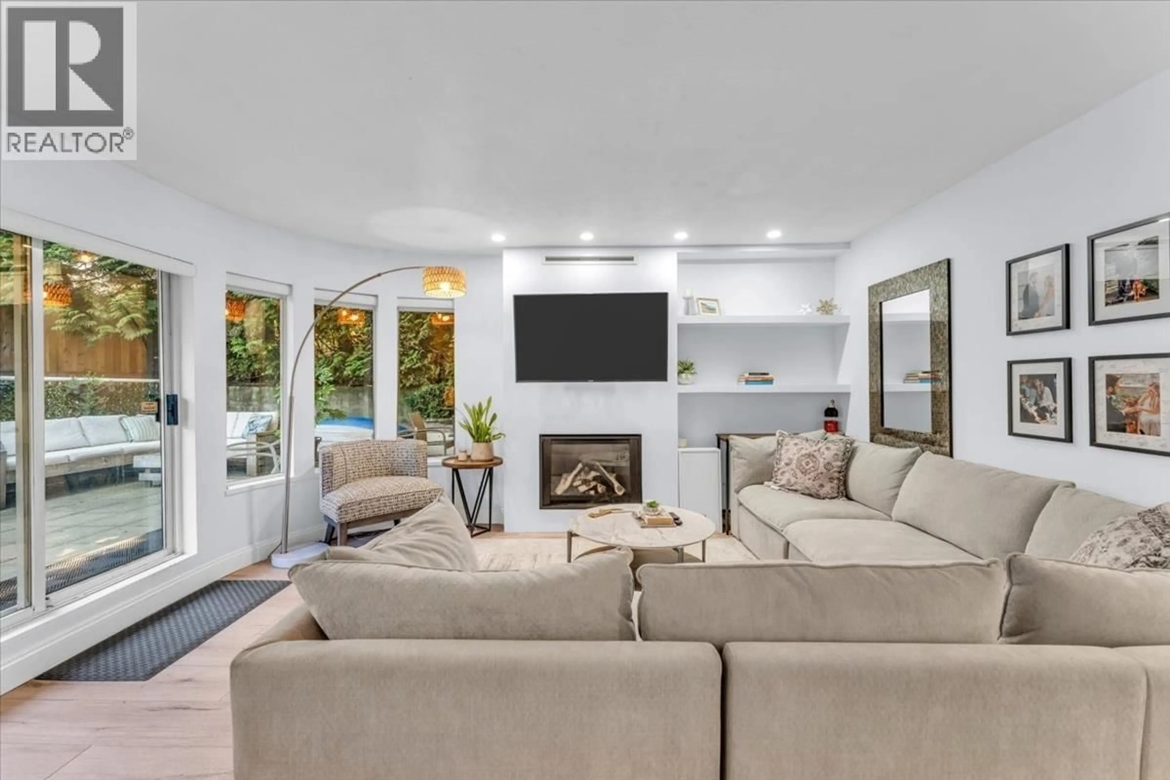 Living room with furniture, ceramic/tile floor for 102 - 320 2ND STREET, North Vancouver British Columbia V7M1E1