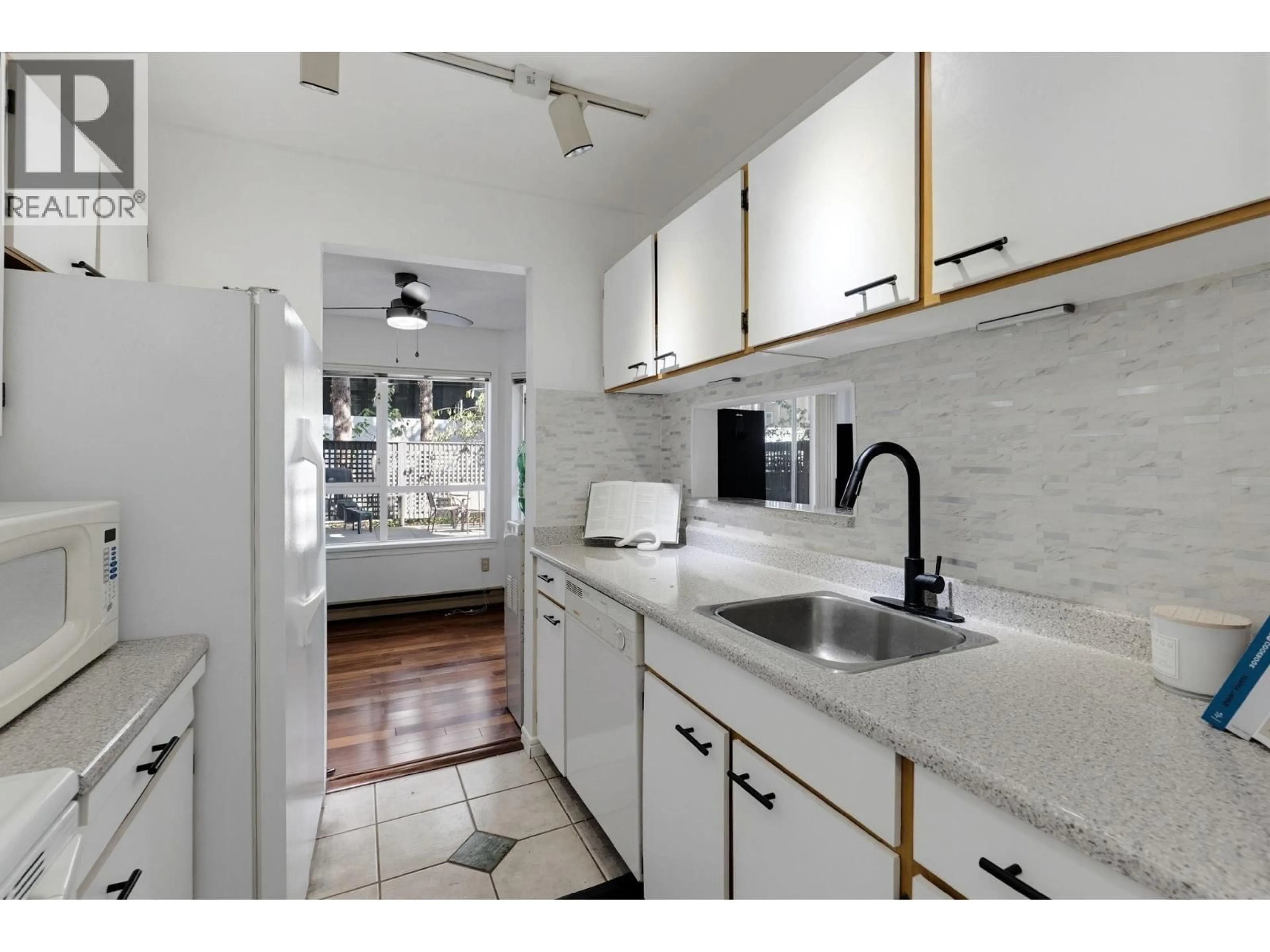 Standard kitchen, ceramic/tile floor for 104 - 555 14TH AVENUE, Vancouver British Columbia V5Z4G8