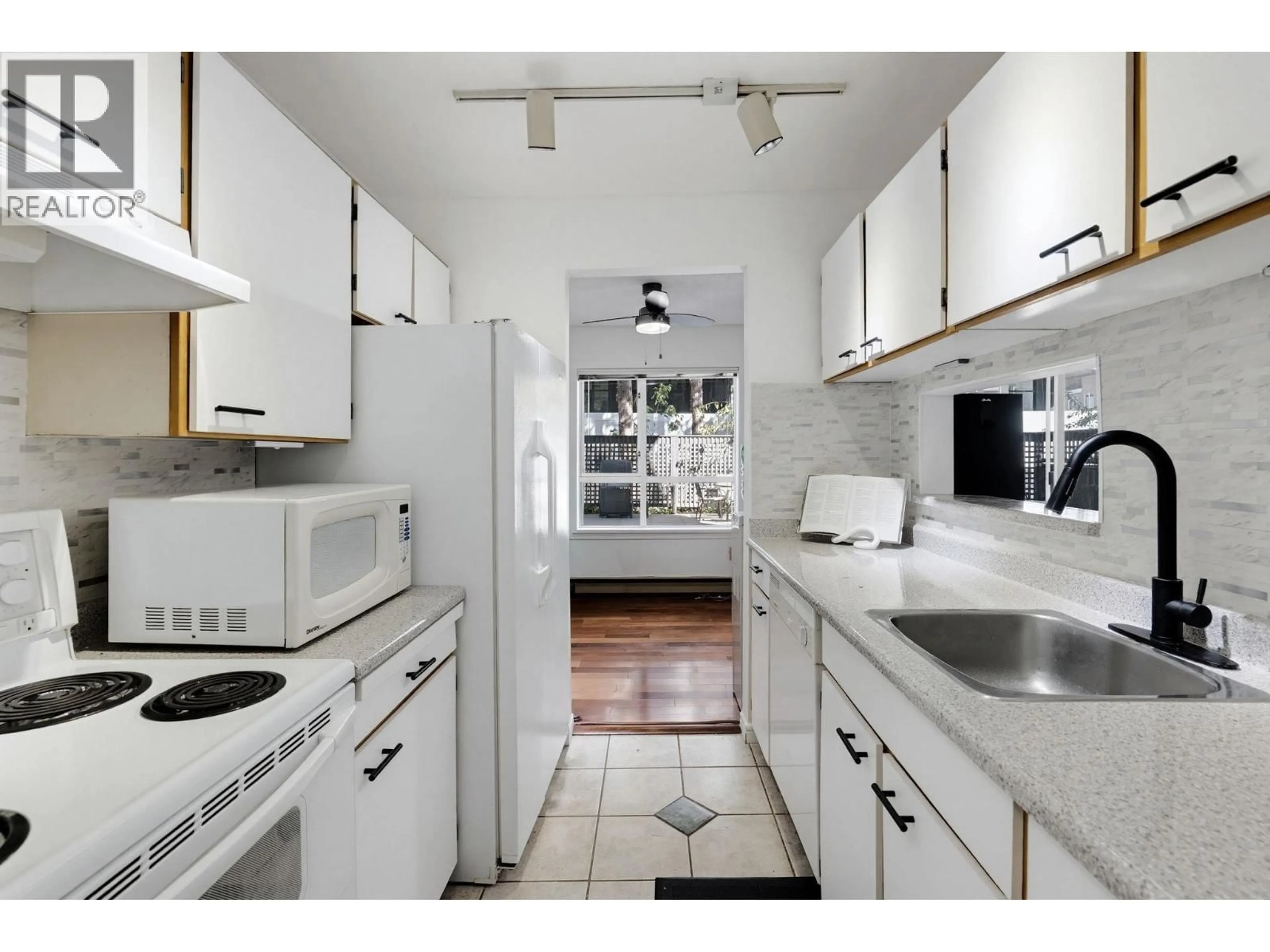 Standard kitchen, ceramic/tile floor for 104 - 555 14TH AVENUE, Vancouver British Columbia V5Z4G8