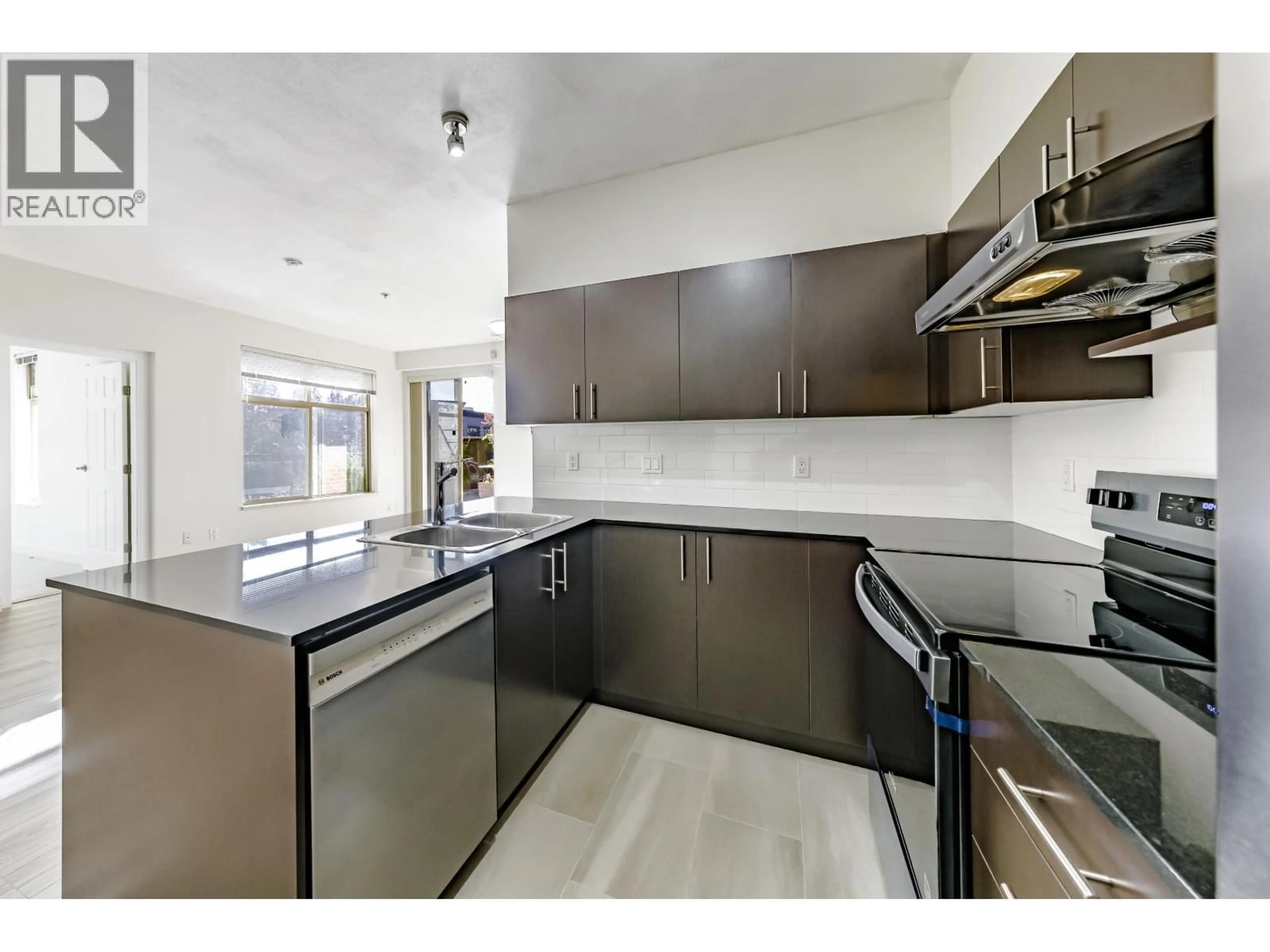Open concept kitchen, unknown for 107 - 1633 MACKAY AVENUE, North Vancouver British Columbia V7P0A2