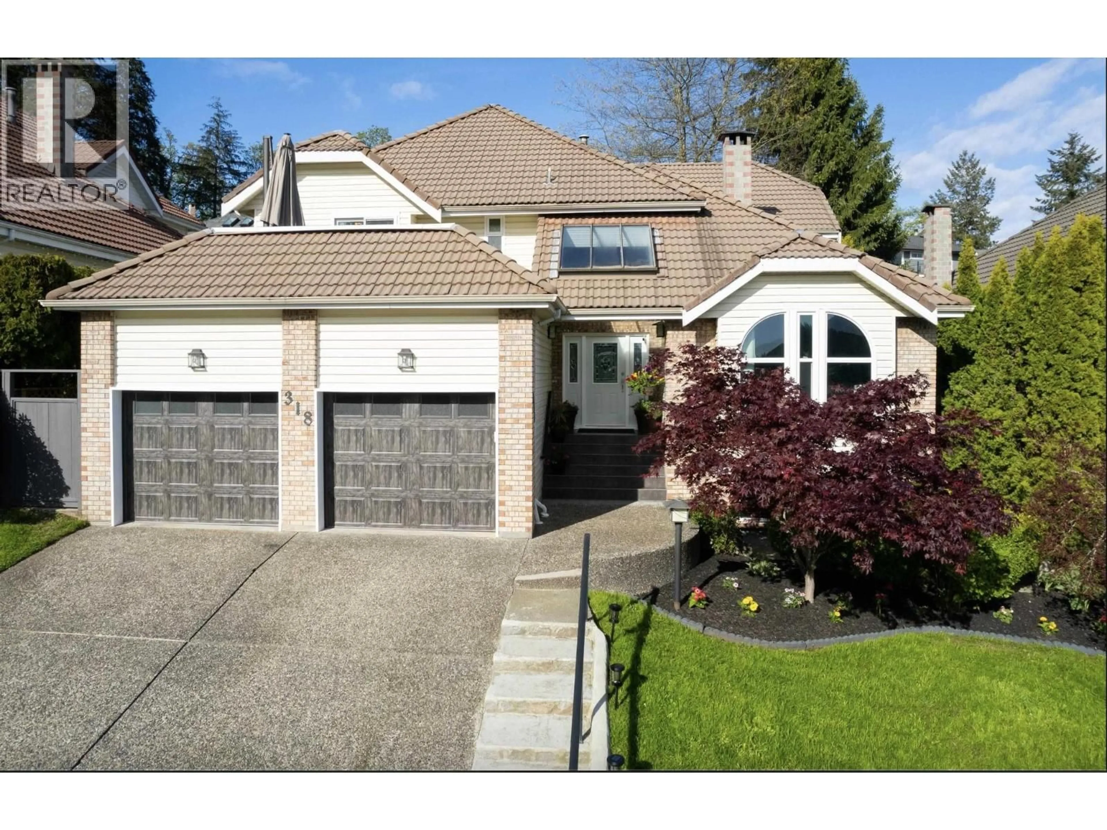 Home with vinyl exterior material, street for 318 ROCHE POINT DRIVE, North Vancouver British Columbia V7G2M2