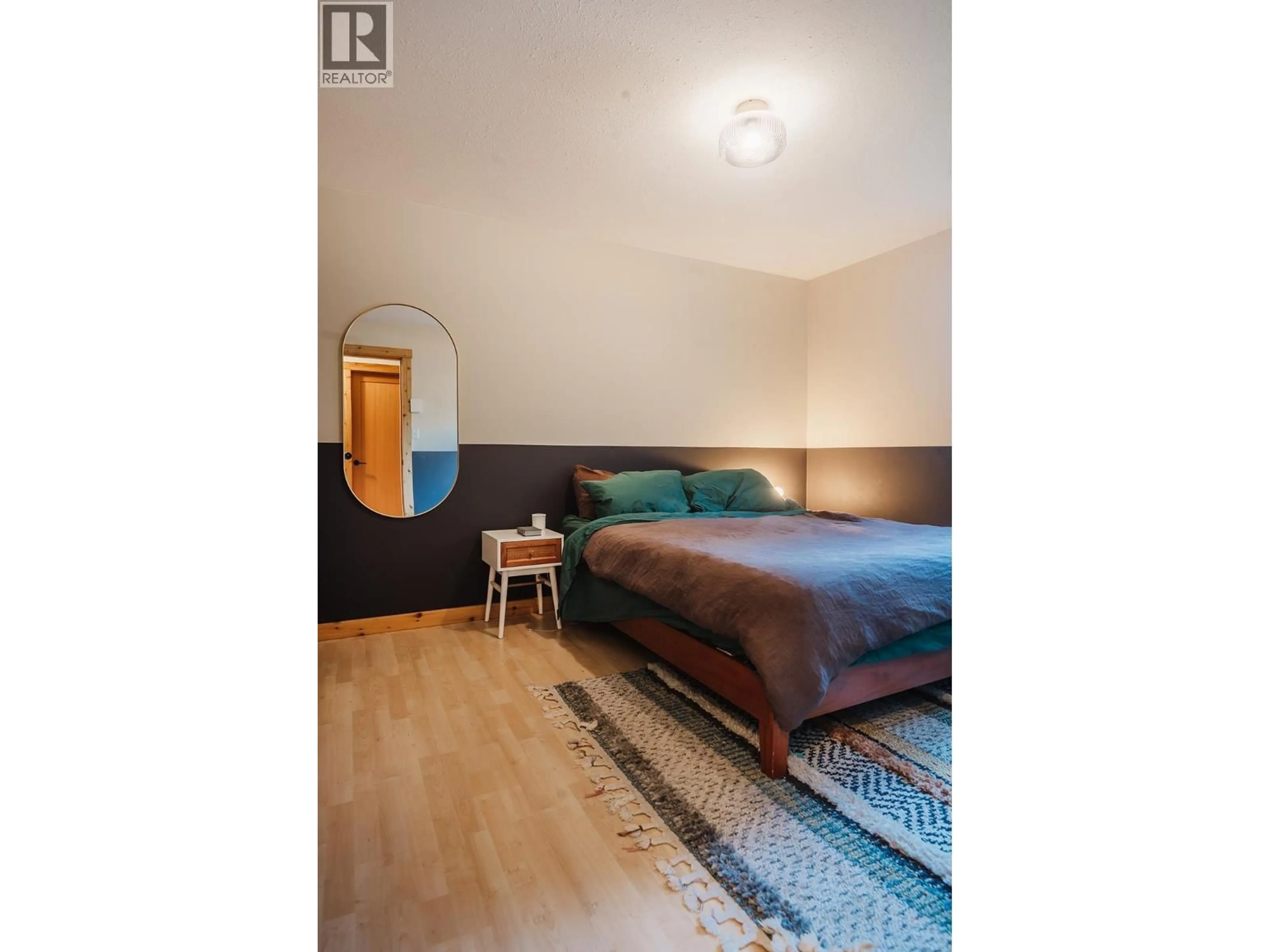 Bedroom with bed, wood/laminate floor for 30 - 622 FARNHAM ROAD, Gibsons British Columbia V0N1V8