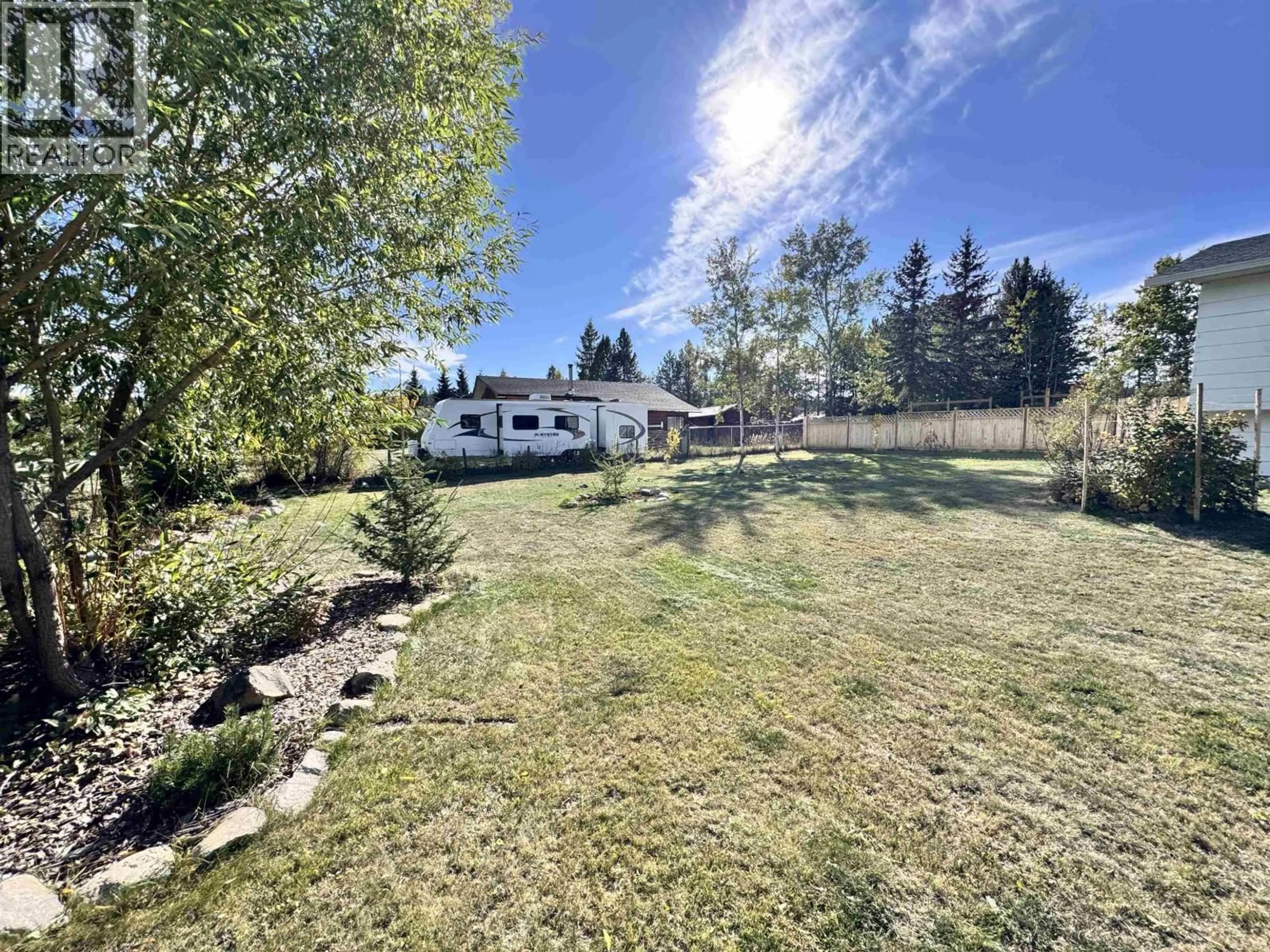 A pic from outside/outdoor area/front of a property/back of a property/a pic from drone, unknown for 6494 GREY CRESCENT, Horse Lake British Columbia V0K2E3