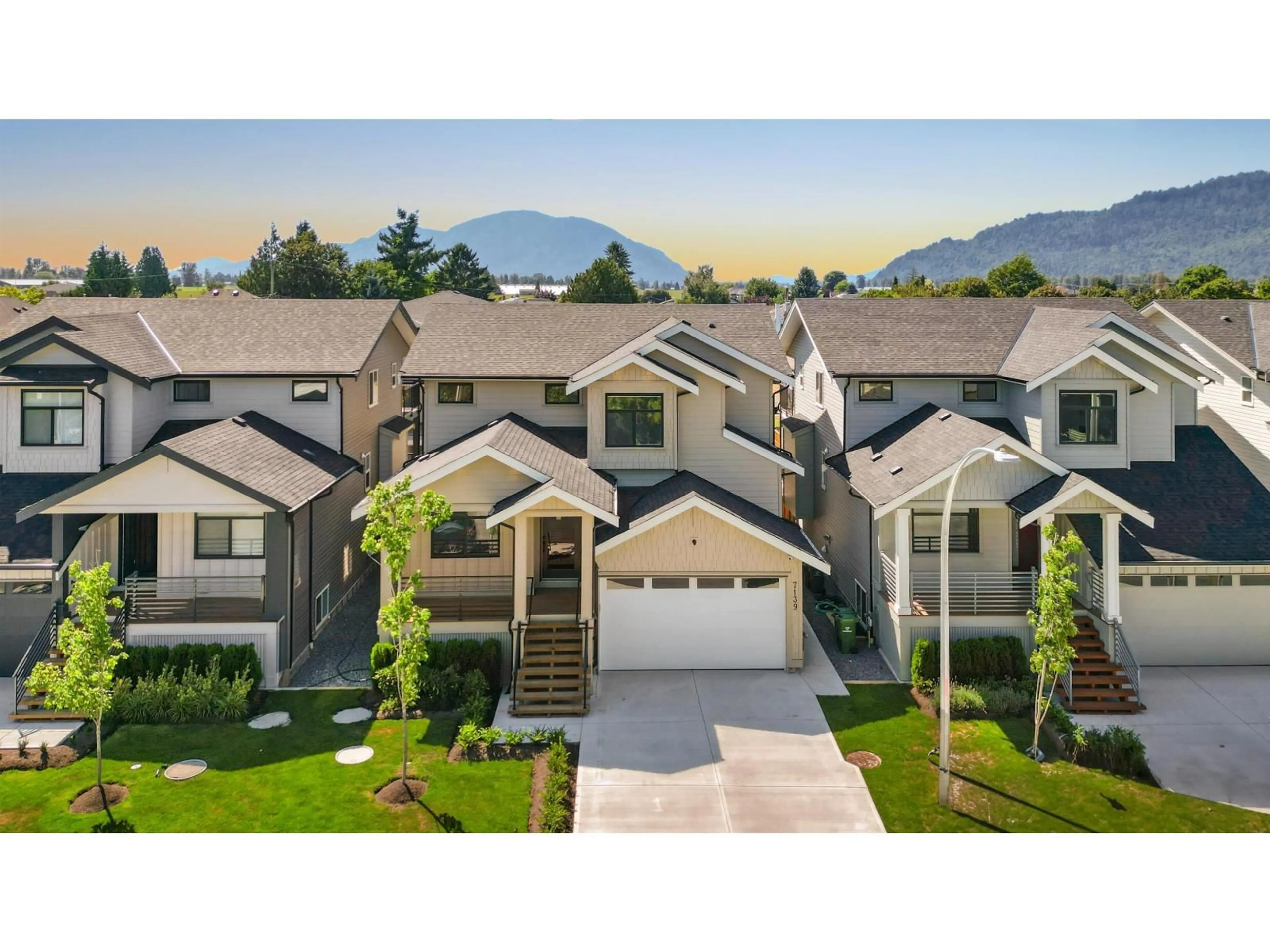 A pic from outside/outdoor area/front of a property/back of a property/a pic from drone, mountain view for 7139 ELWOOD DRIVE, Chilliwack British Columbia V2R1G8