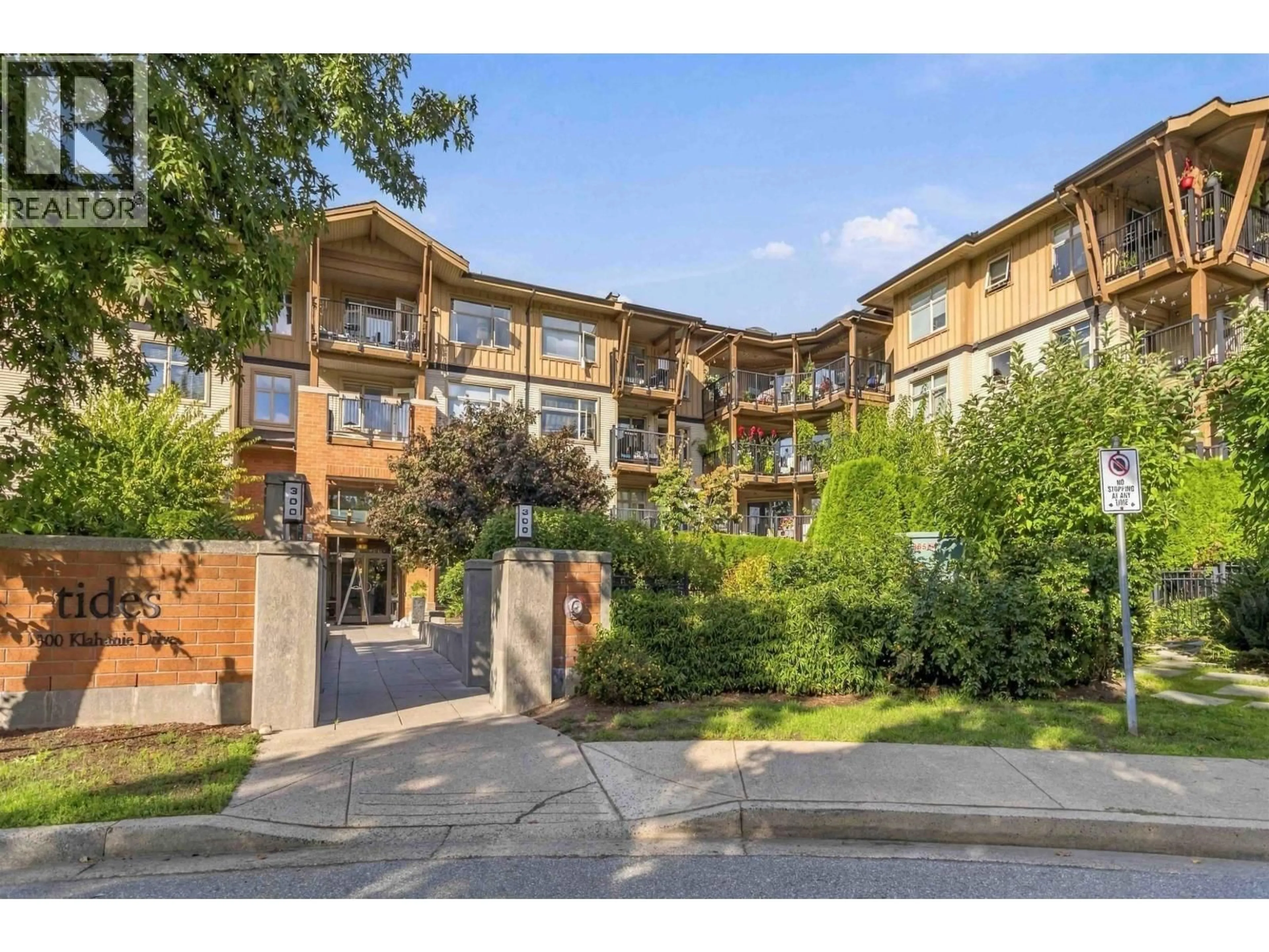 A pic from outside/outdoor area/front of a property/back of a property/a pic from drone, street for 109 - 300 KLAHANIE DRIVE, Port Moody British Columbia V3H5K8