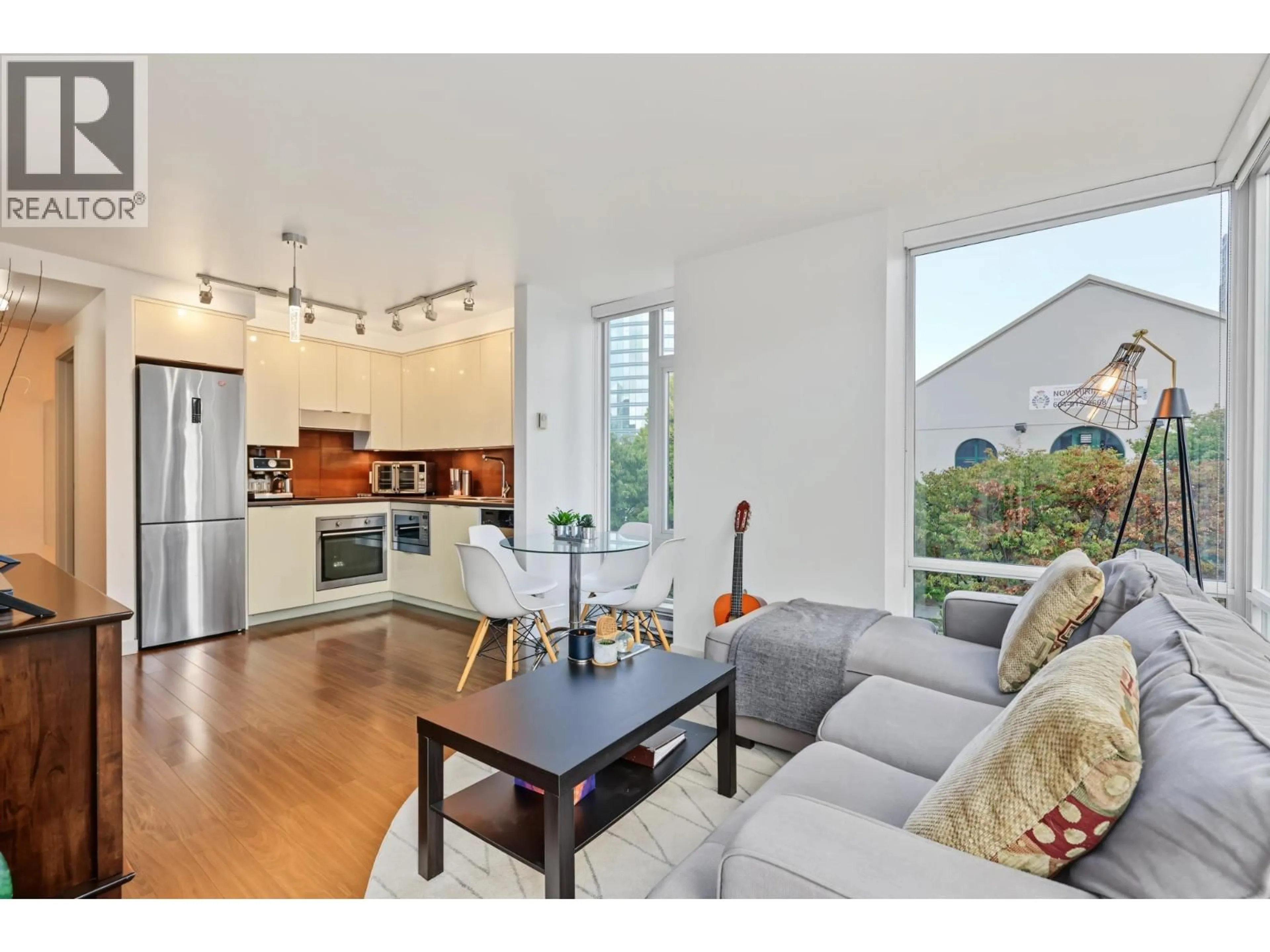 Open concept kitchen, wood/laminate floor for 315 - 161 GEORGIA STREET, Vancouver British Columbia V6B4P4
