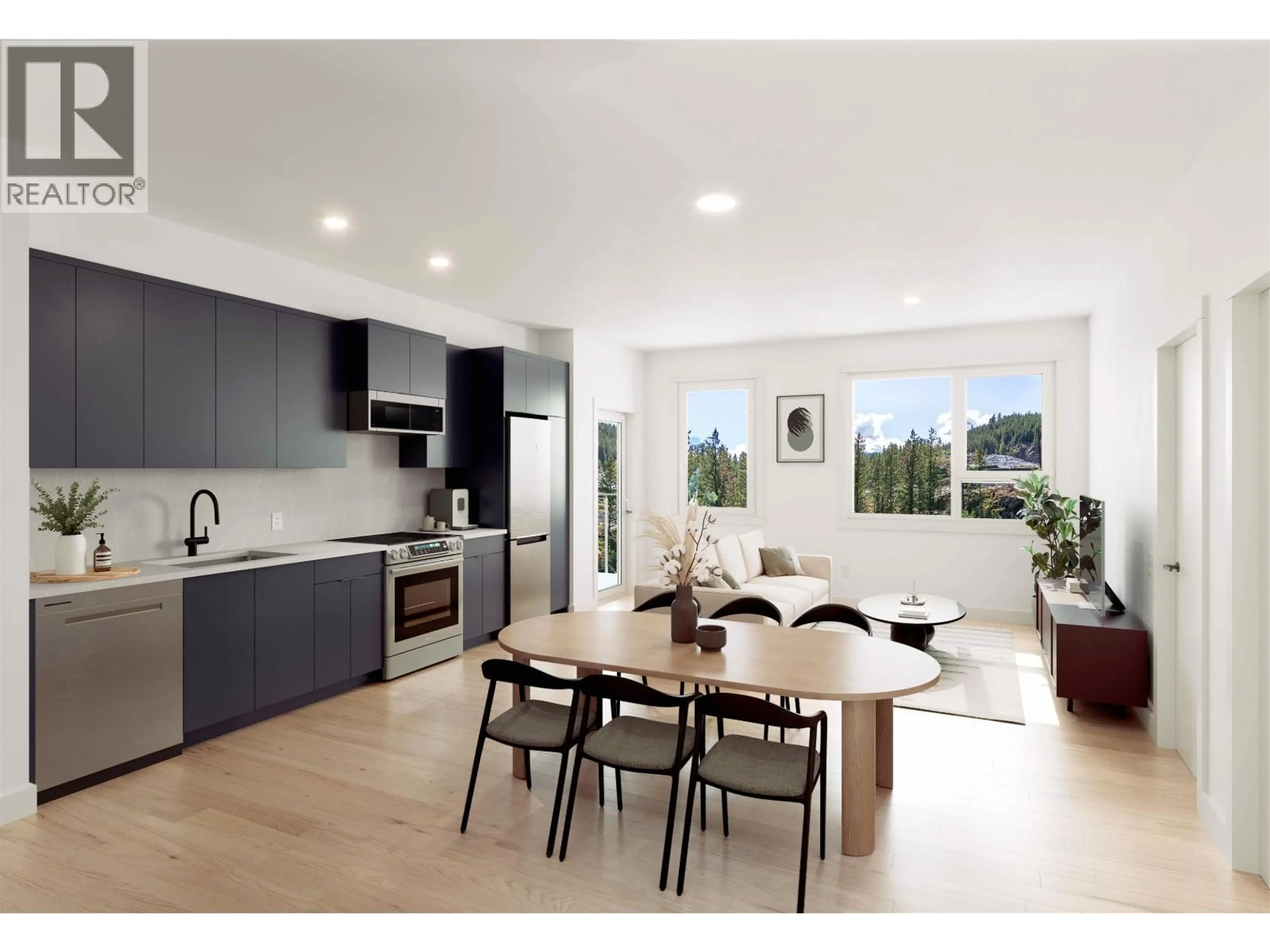 Open concept kitchen, wood/laminate floor for 201 - 1055 RAVEN DRIVE, Squamish British Columbia V0V0V0