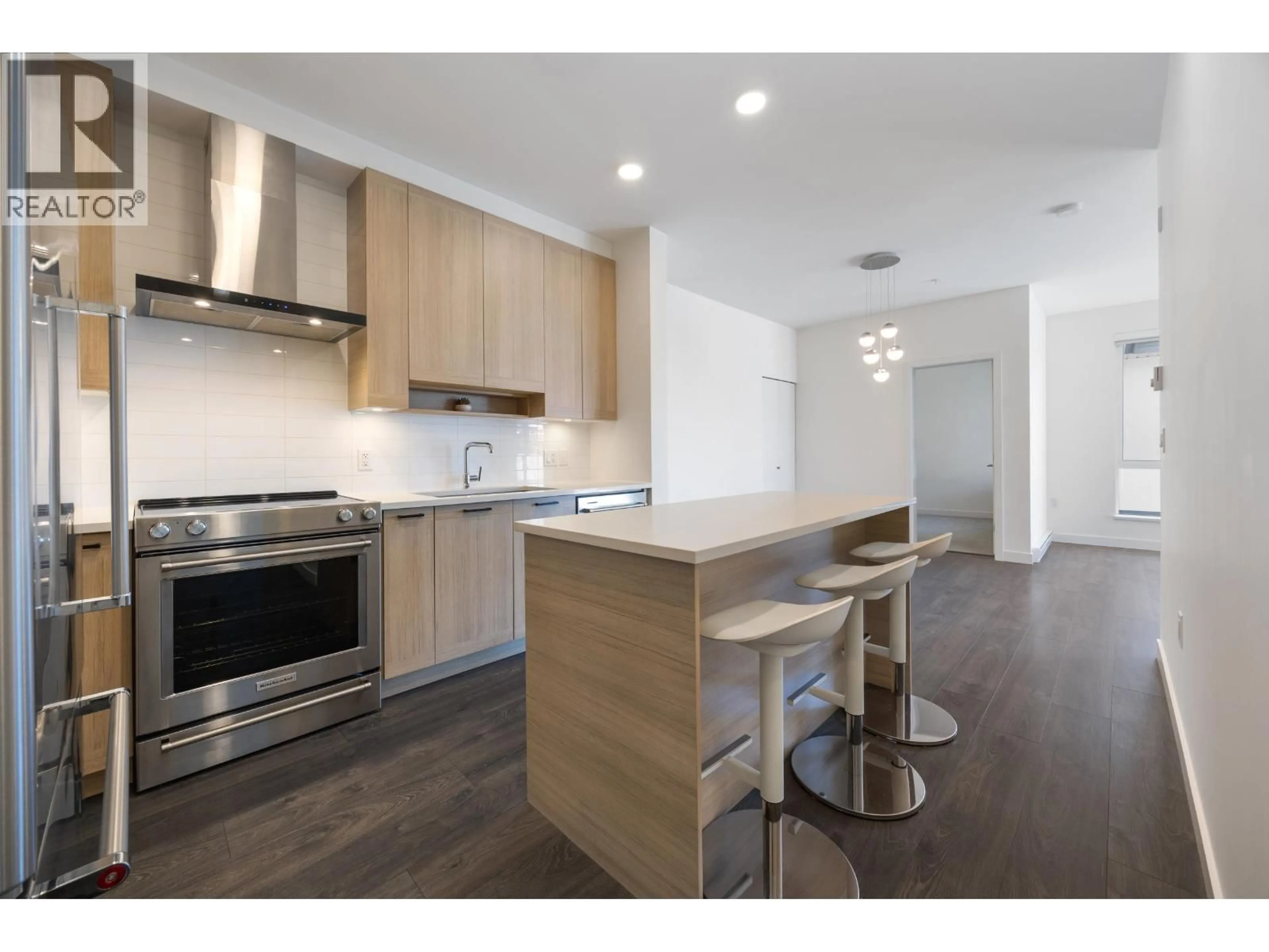 Open concept kitchen, wood/laminate floor for 601 - 7133 14TH AVENUE, Burnaby British Columbia V3N0H5