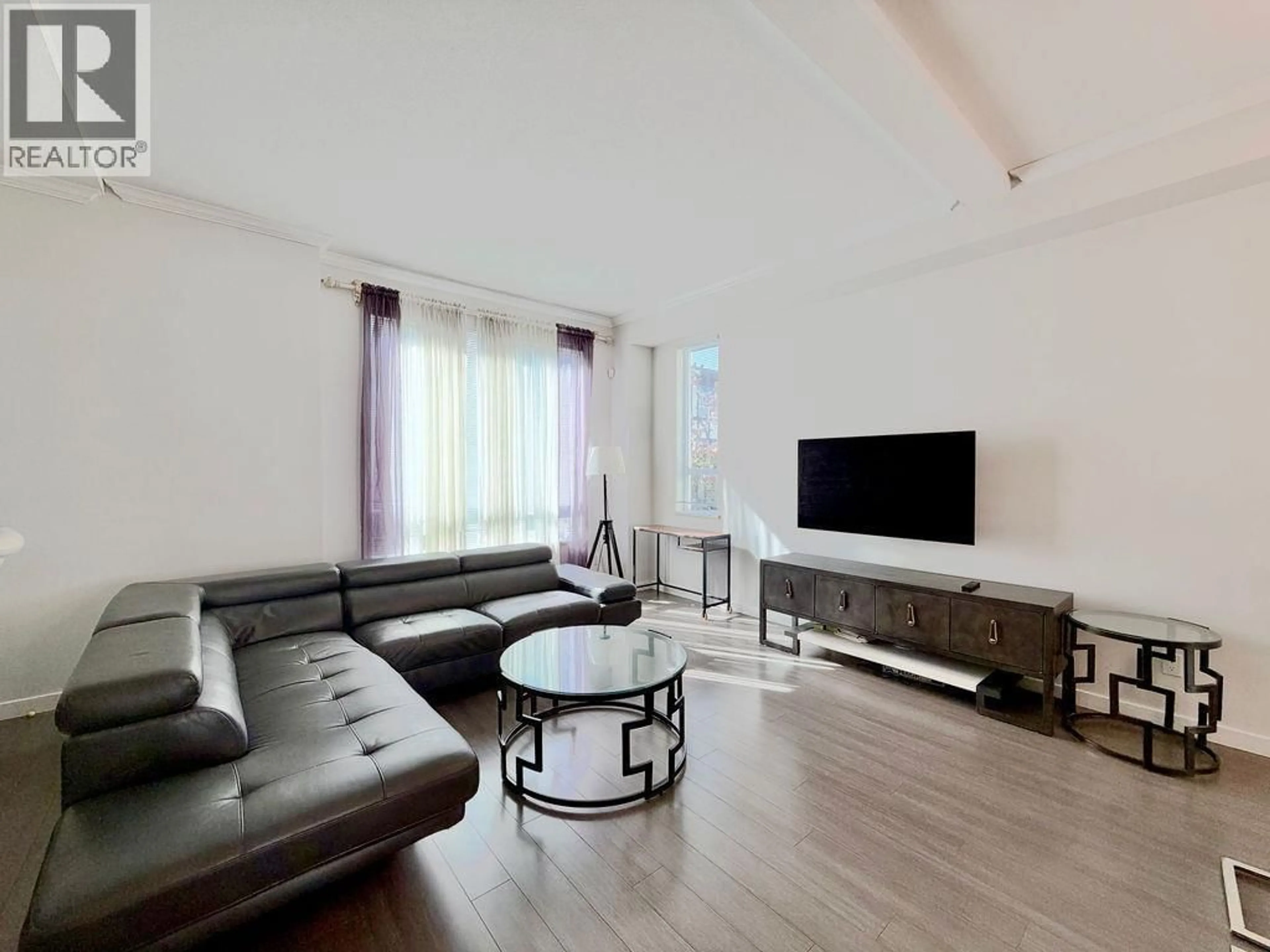Living room with furniture, unknown for 102 - 10388 NO. 2 ROAD, Richmond British Columbia V7E0B9