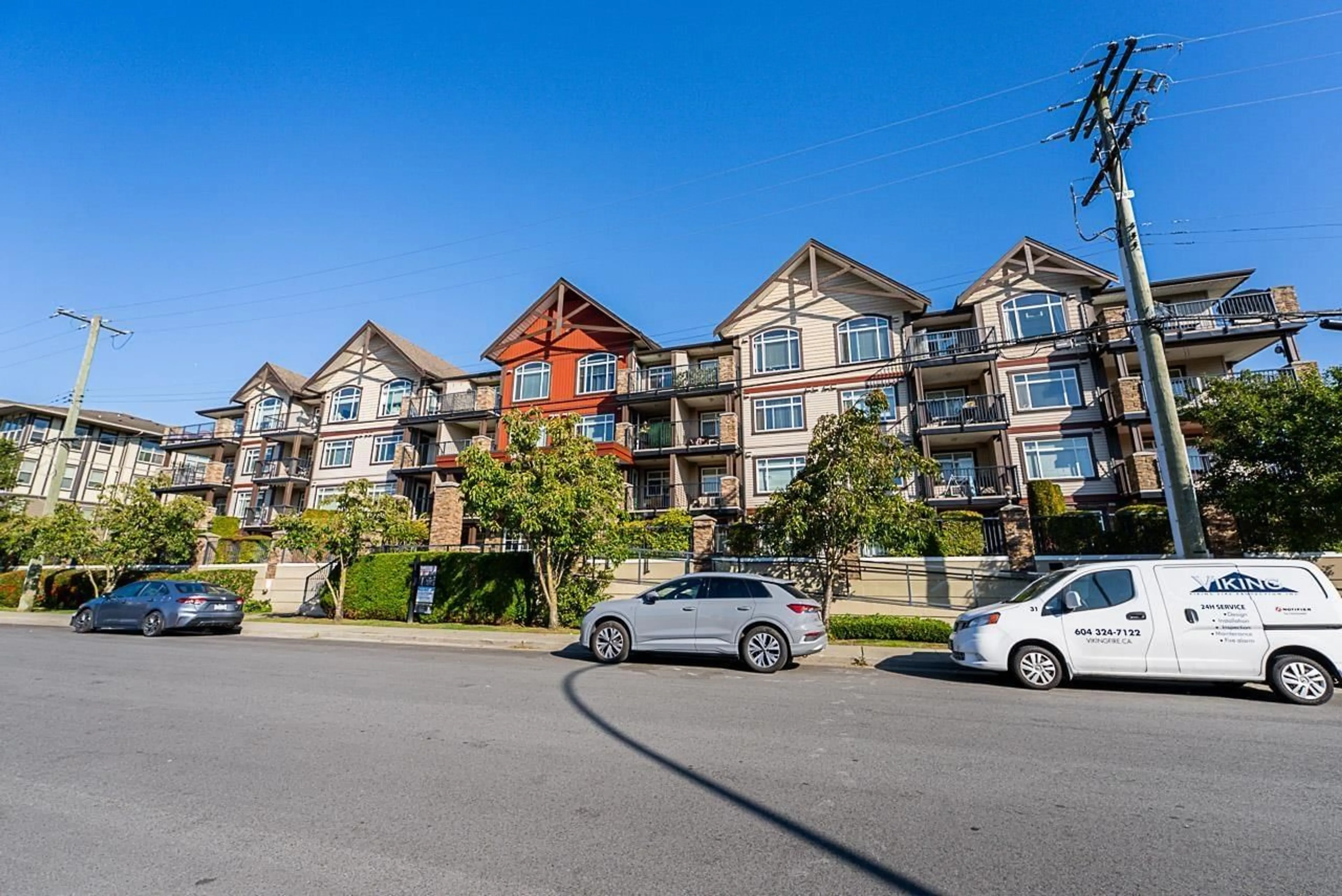 A pic from outside/outdoor area/front of a property/back of a property/a pic from drone, unknown for 407 - 19939 55A AVENUE, Langley British Columbia V3A3X4