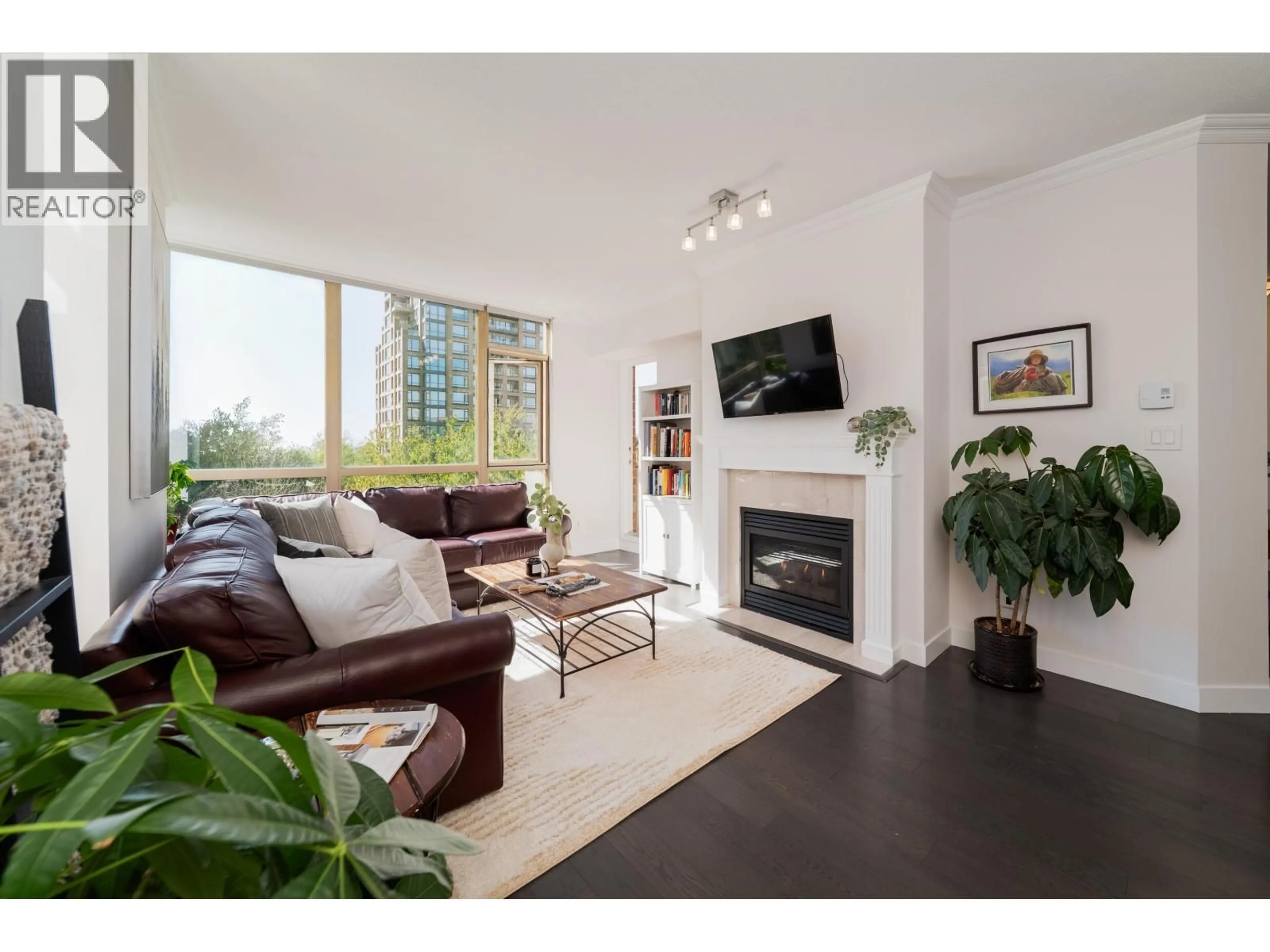 Living room with furniture, wood/laminate floor for 507 - 6838 STATION HILL DRIVE, Burnaby British Columbia V3N5A4