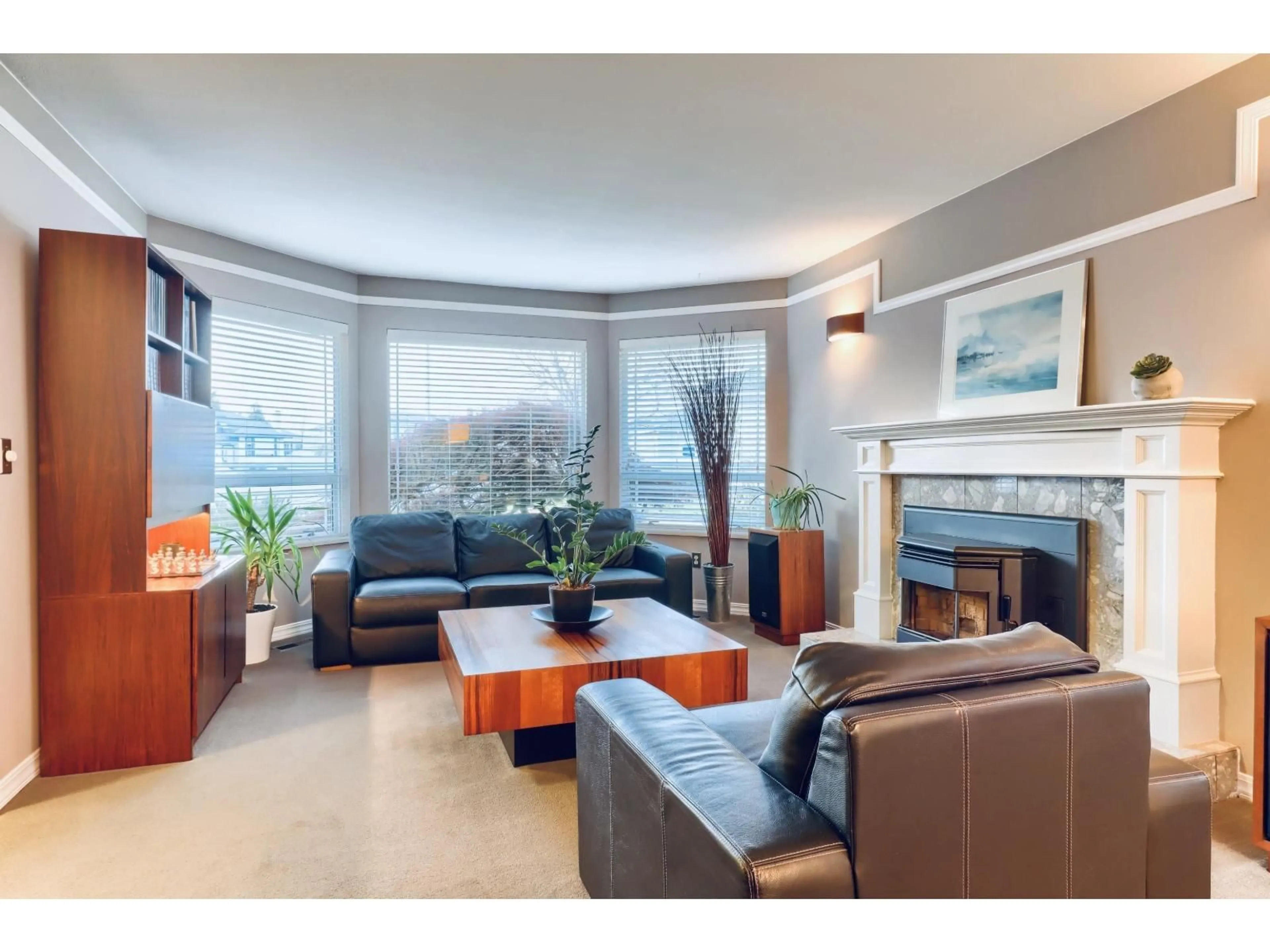 Living room with furniture, wood/laminate floor for 8832 143 STREET, Surrey British Columbia V3V7T2