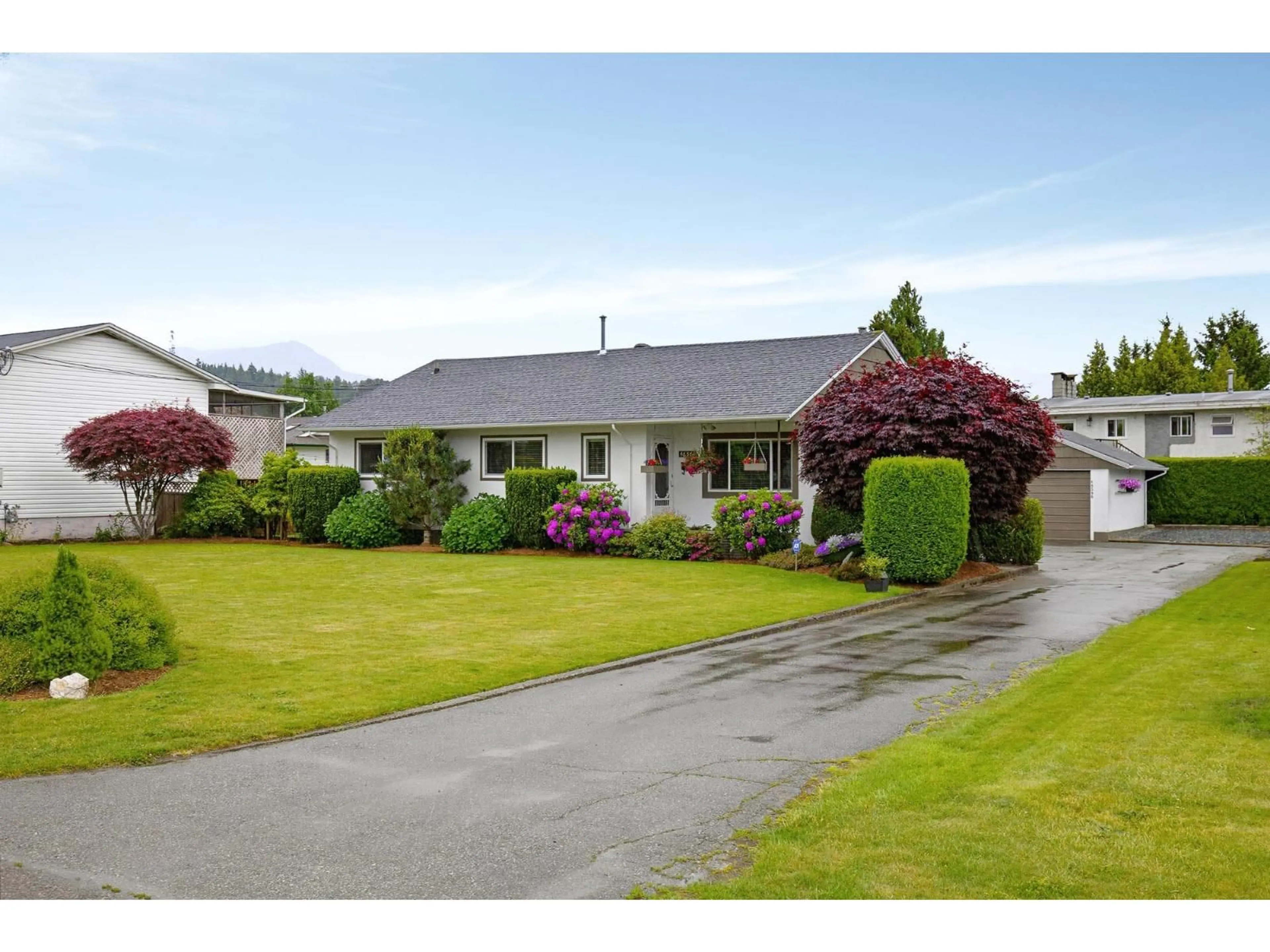 A pic from outside/outdoor area/front of a property/back of a property/a pic from drone, street for 46566 BRICE ROAD, Chilliwack British Columbia V2P3V5