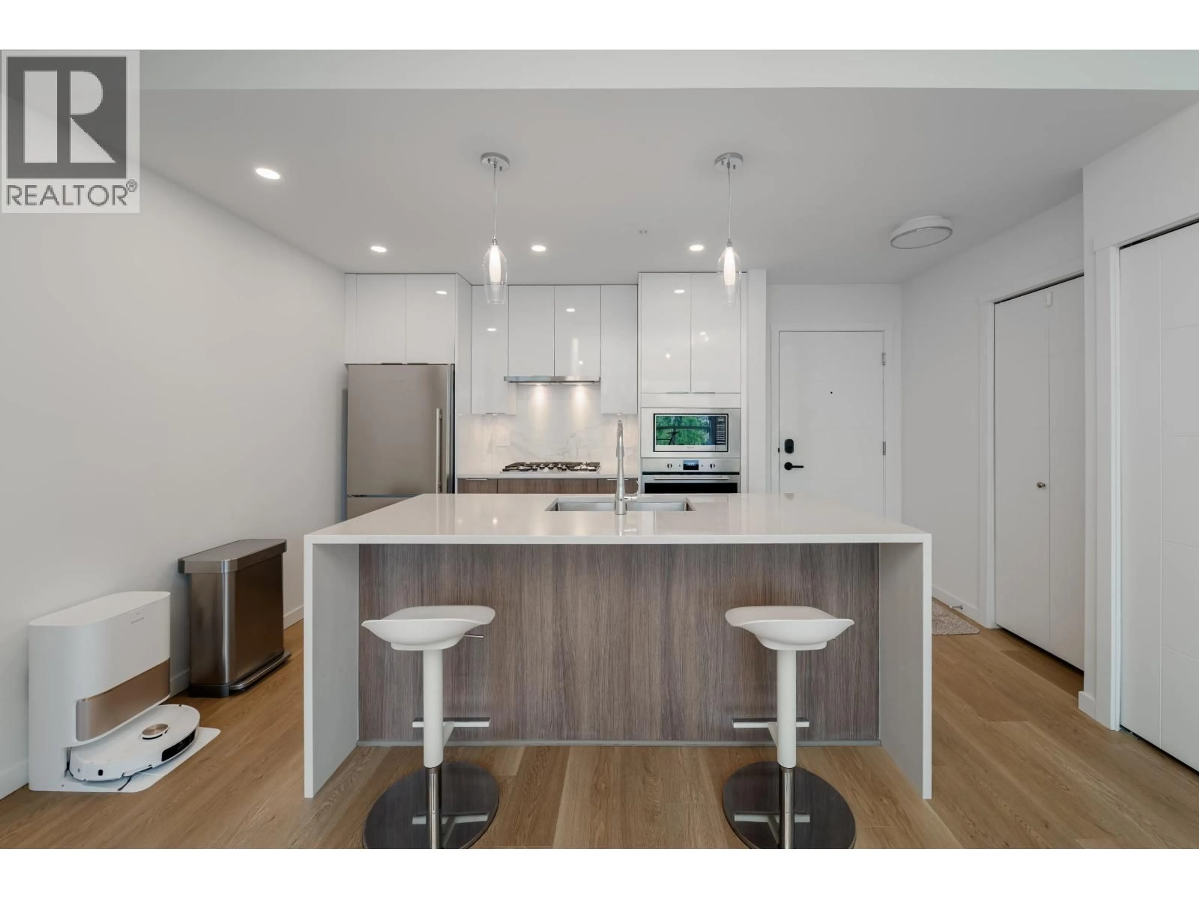 Open concept kitchen, wood/laminate floor for 413 - 11641 227 STREET, Maple Ridge British Columbia V2X9J6