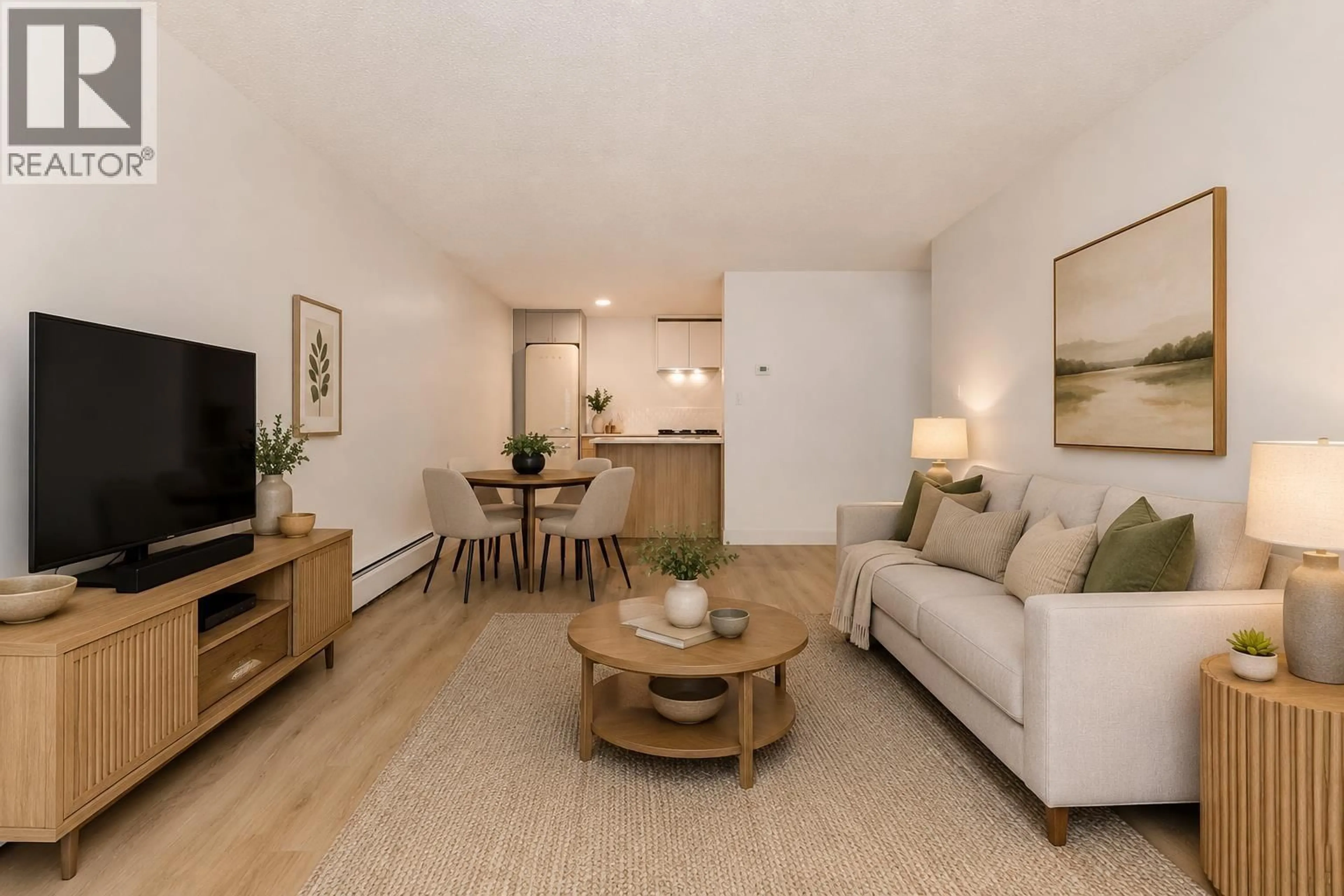Living room with furniture, wood/laminate floor for 102 - 270 3RD STREET, North Vancouver British Columbia V7M1G1