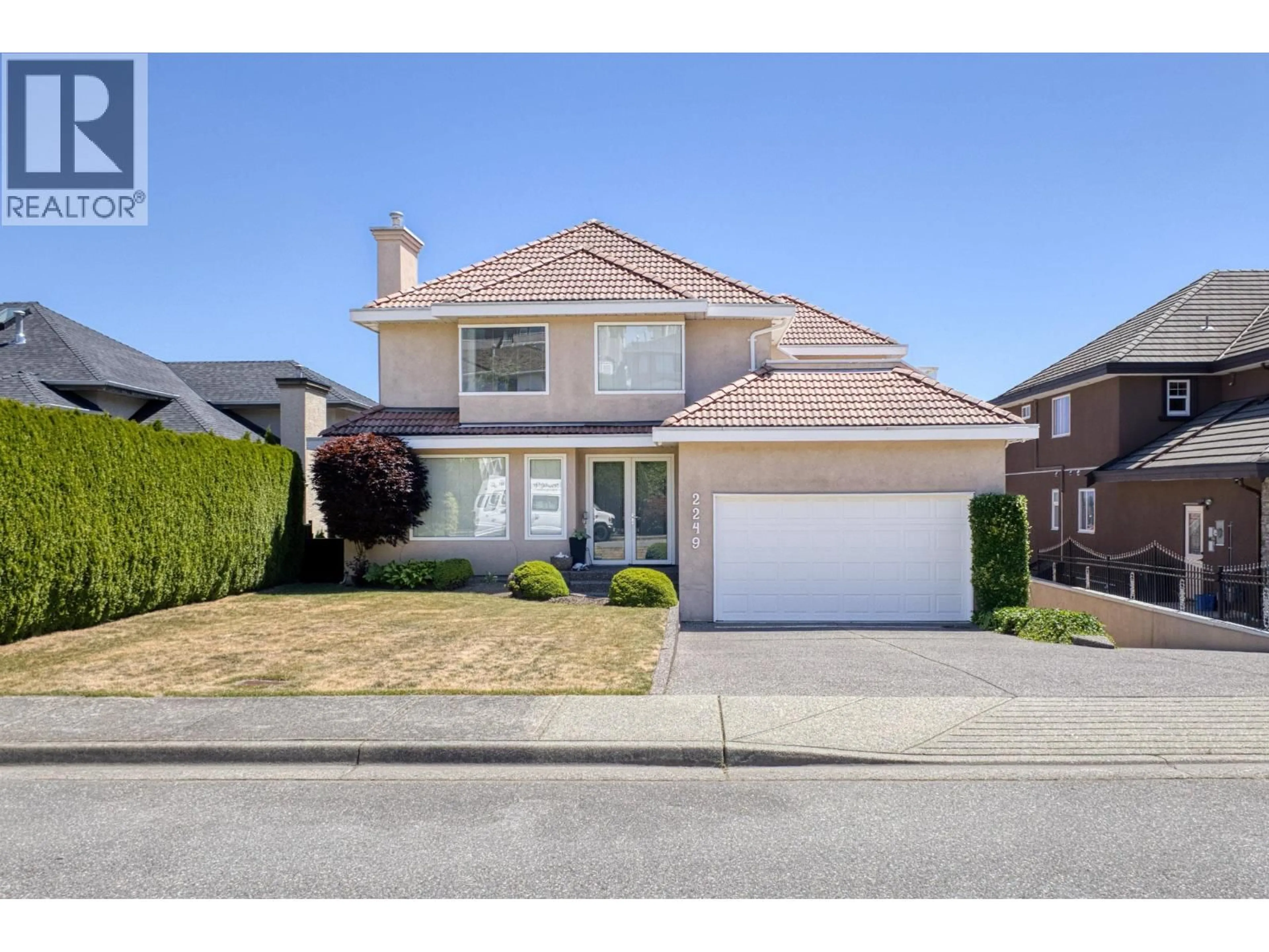 Home with vinyl exterior material, street for 2249 SICAMOUS AVENUE, Coquitlam British Columbia V3K6R9