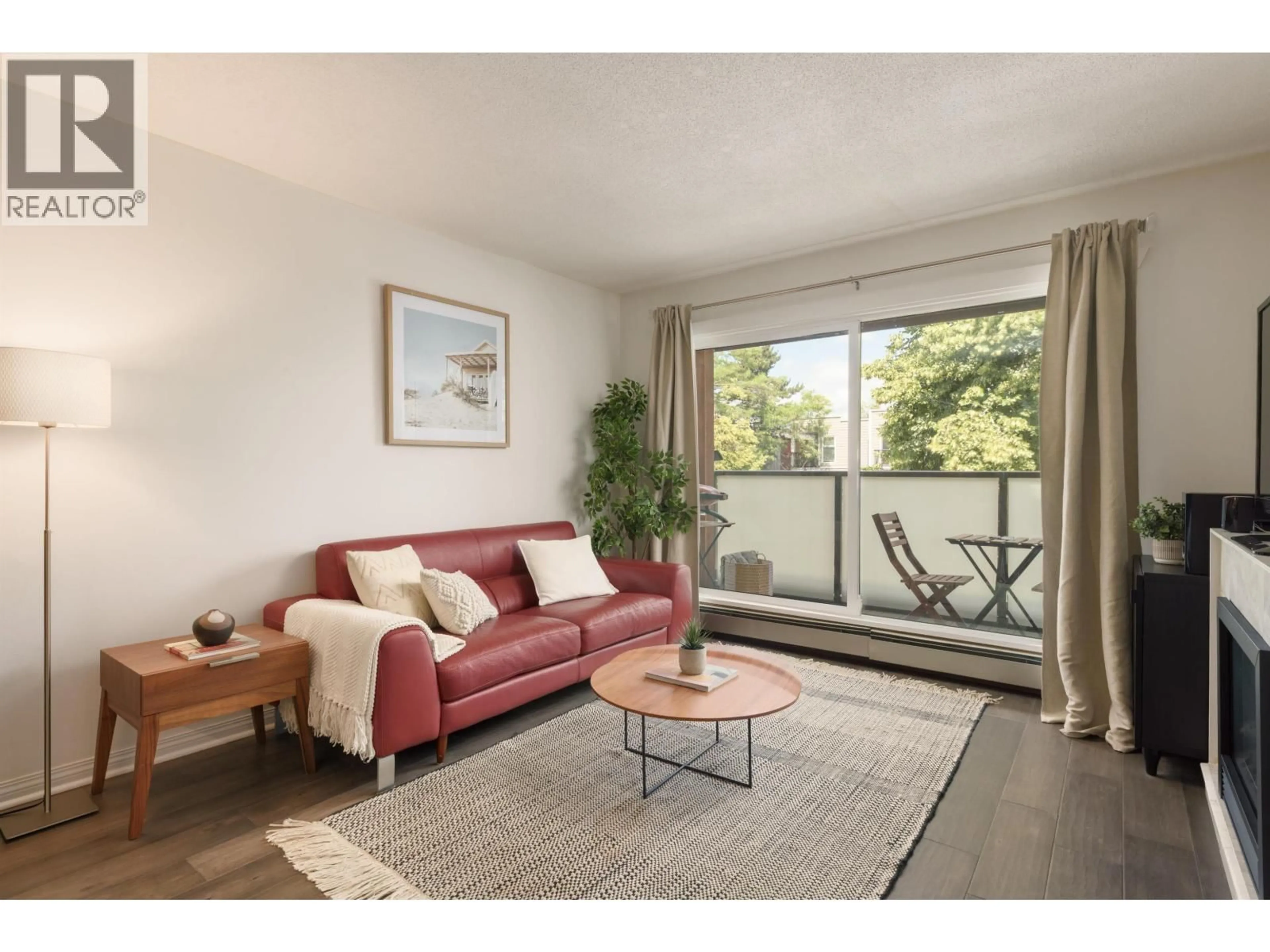 Living room with furniture, wood/laminate floor for 306 - 570 8TH AVENUE, Vancouver British Columbia V5T1S8