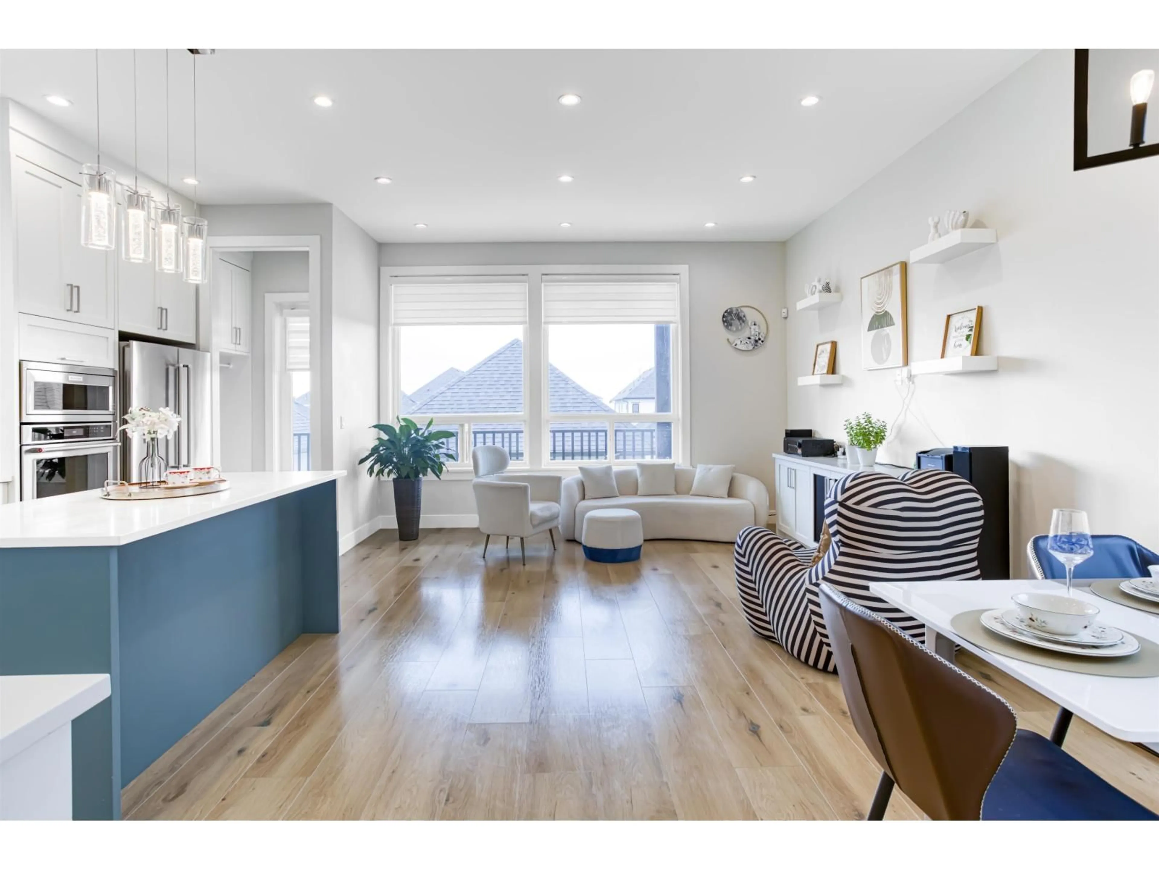 Open concept kitchen, wood/laminate floor for 16774 20A AVENUE, Surrey British Columbia V3Z9M9