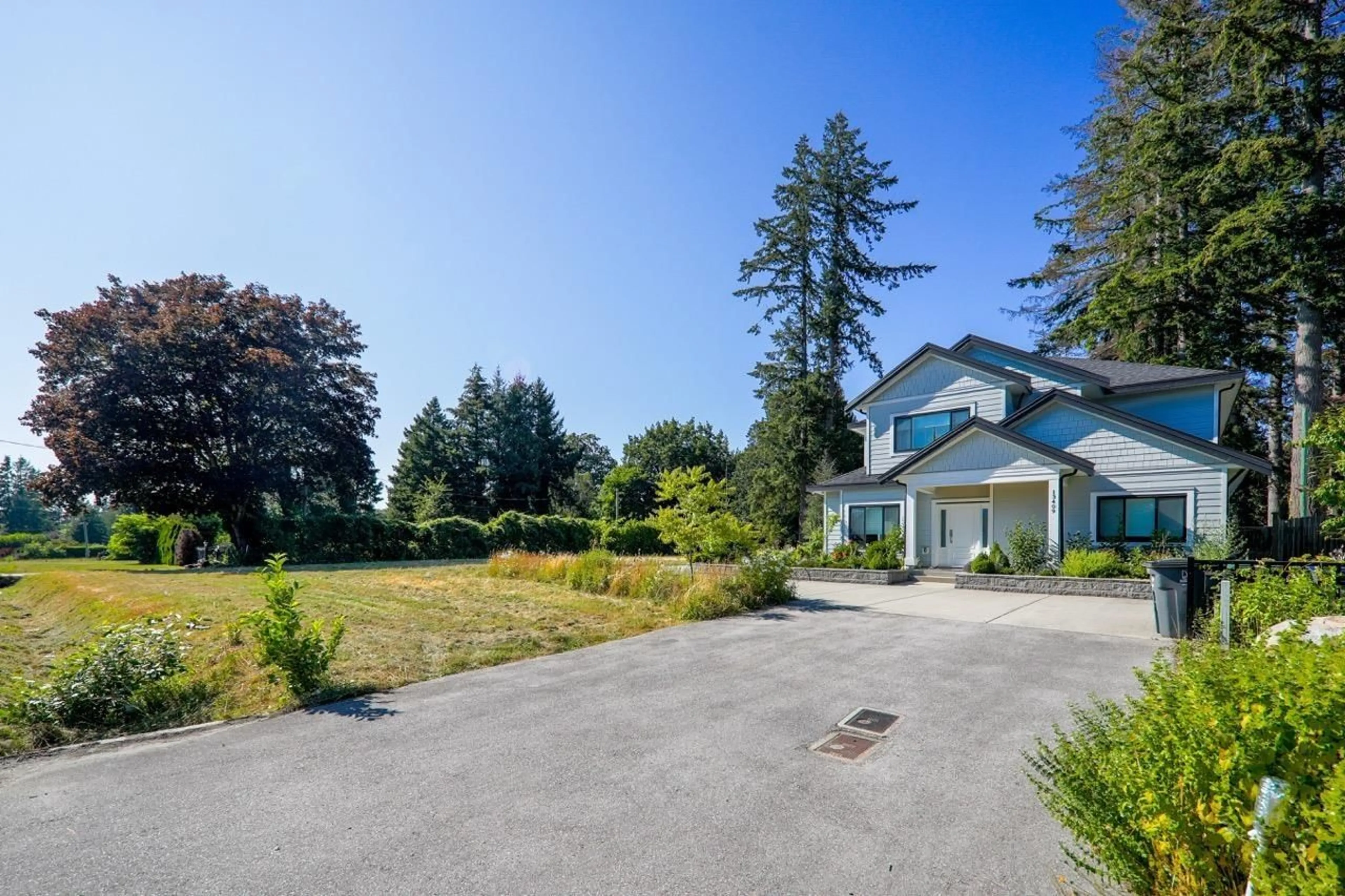 A pic from outside/outdoor area/front of a property/back of a property/a pic from drone, street for 13409 56 AVENUE, Surrey British Columbia V3X2Z5