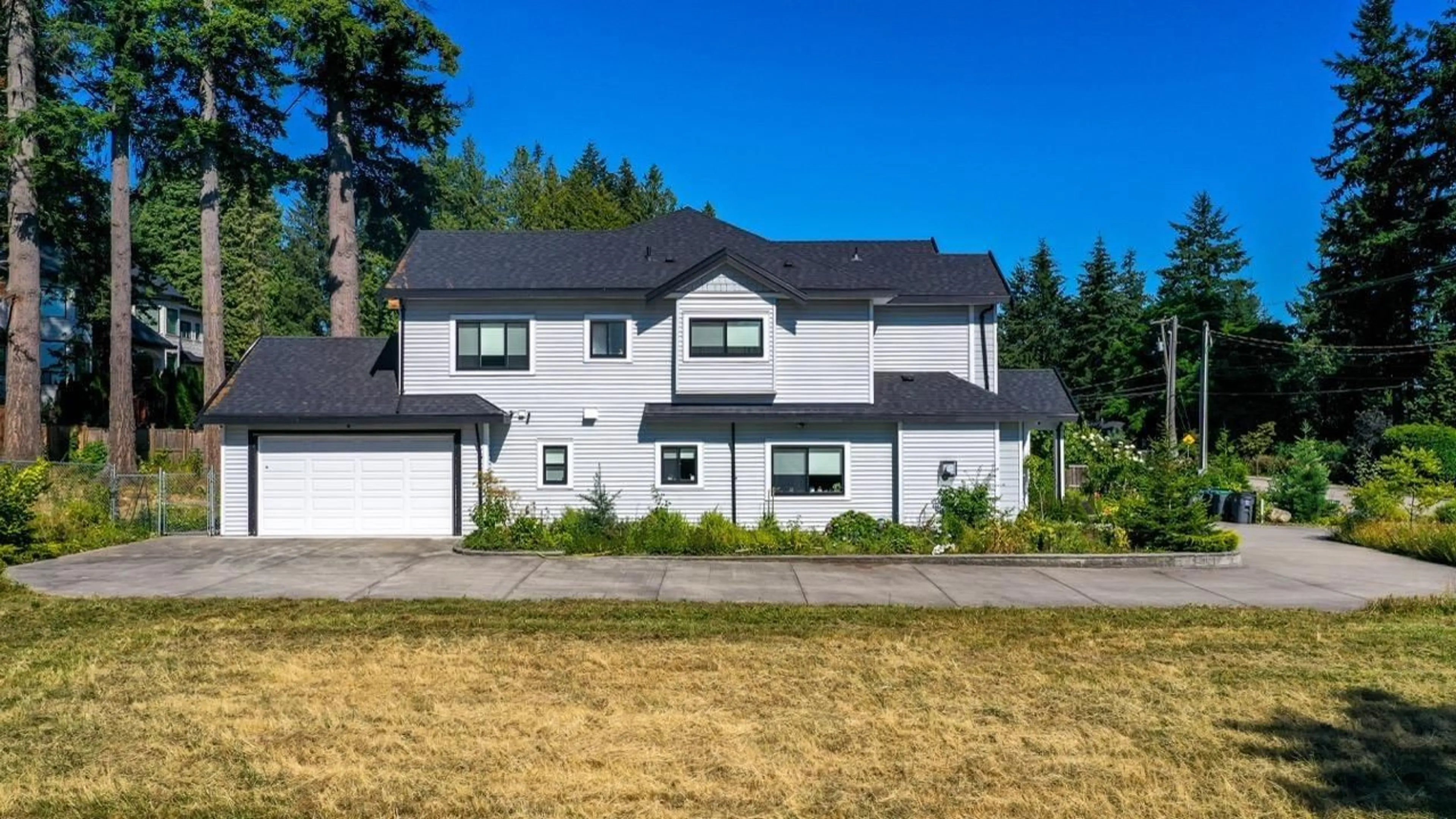 Home with vinyl exterior material, street for 13409 56 AVENUE, Surrey British Columbia V3X2Z5