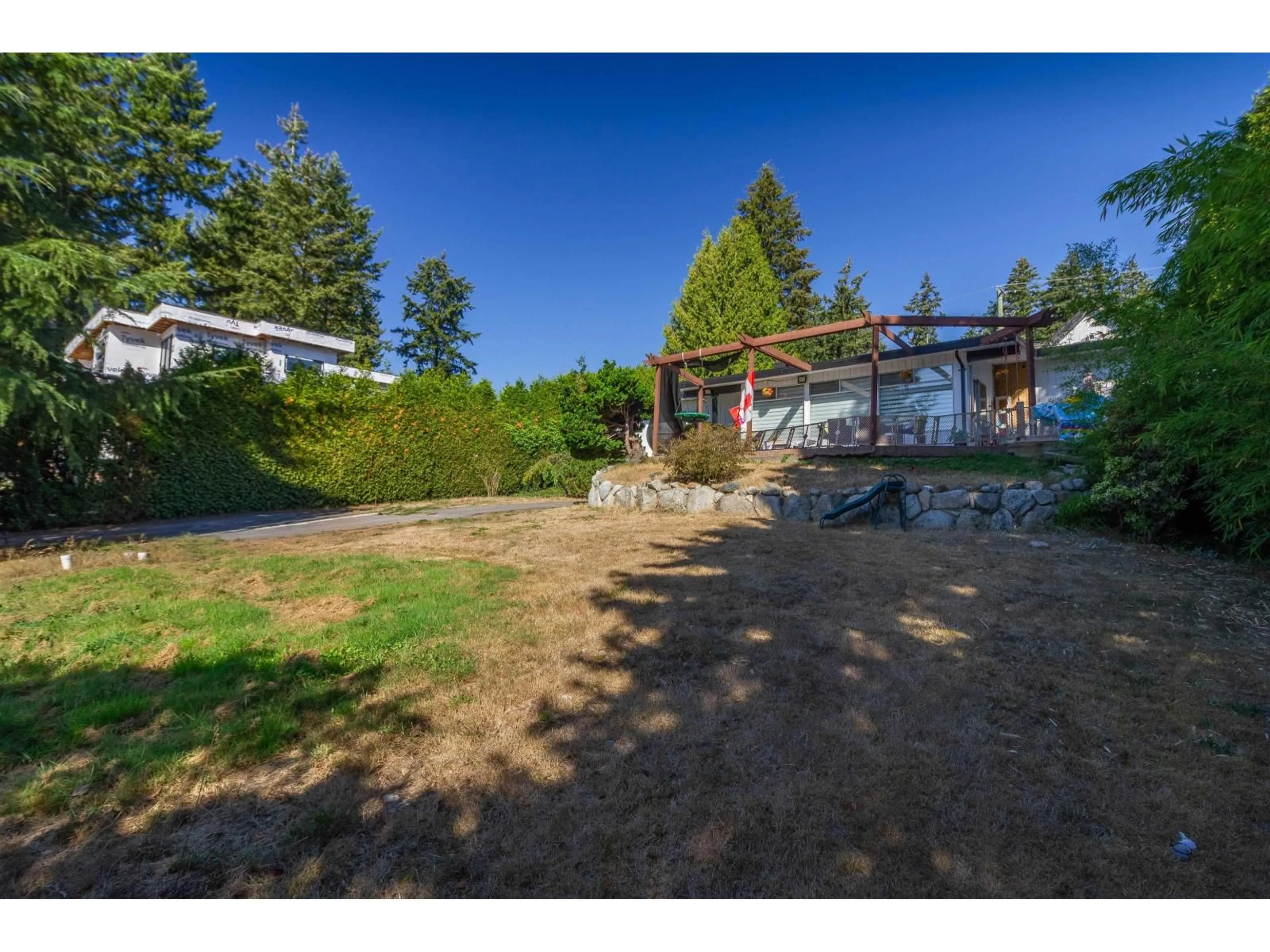 A pic from outside/outdoor area/front of a property/back of a property/a pic from drone, unknown for 14319 55A AVENUE, Surrey British Columbia V3X1B3
