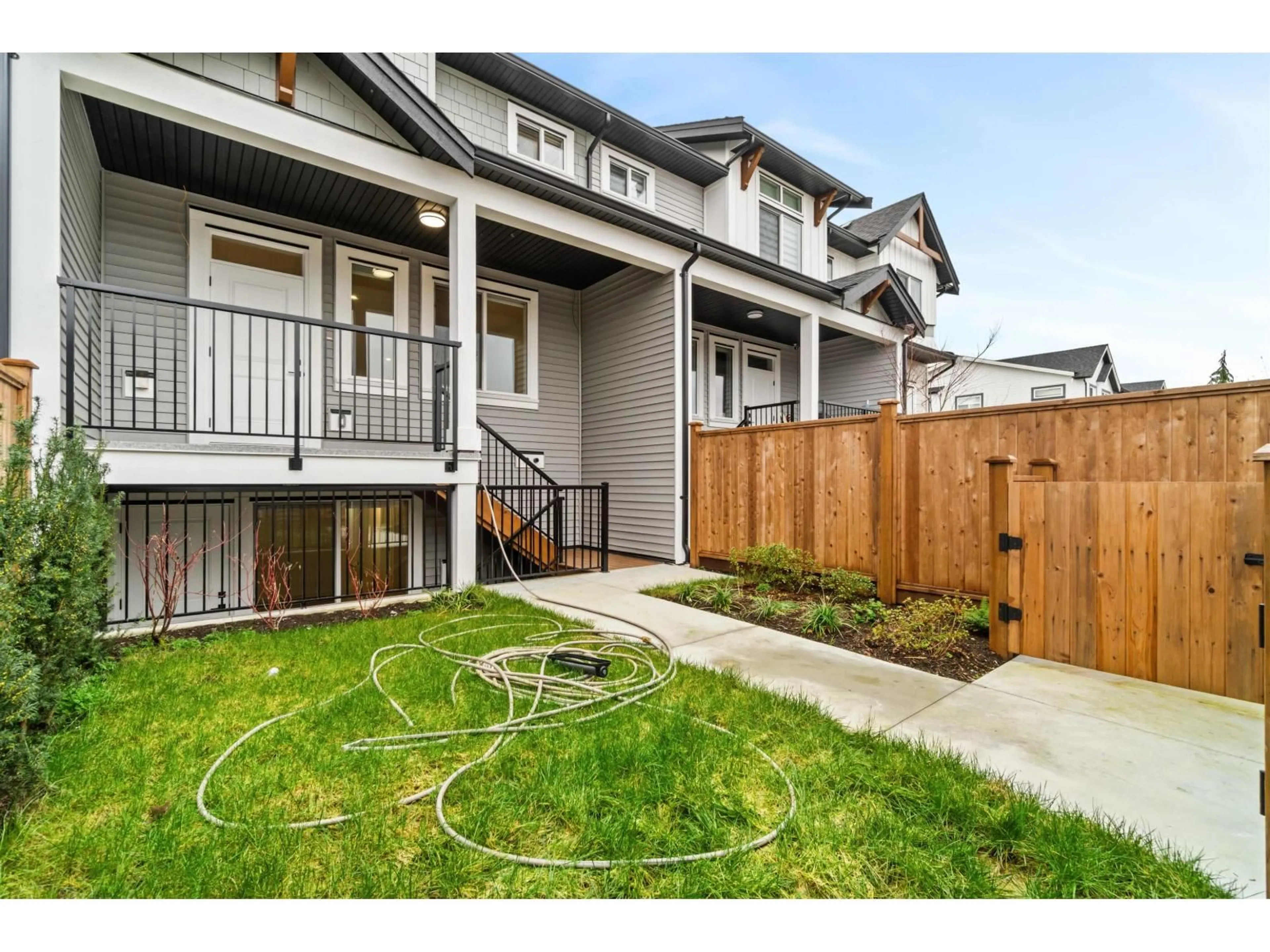 Home with vinyl exterior material, street for 20997 83 AVENUE, Langley British Columbia V2Y4K4