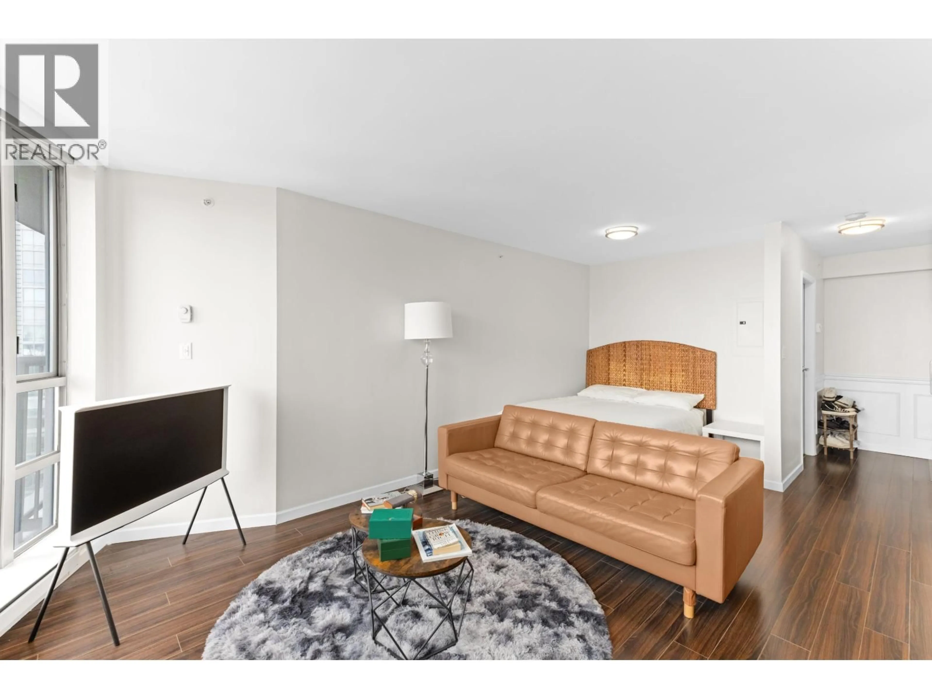 Living room with furniture, wood/laminate floor for 2410 - 501 PACIFIC STREET, Vancouver British Columbia V6Z2X6