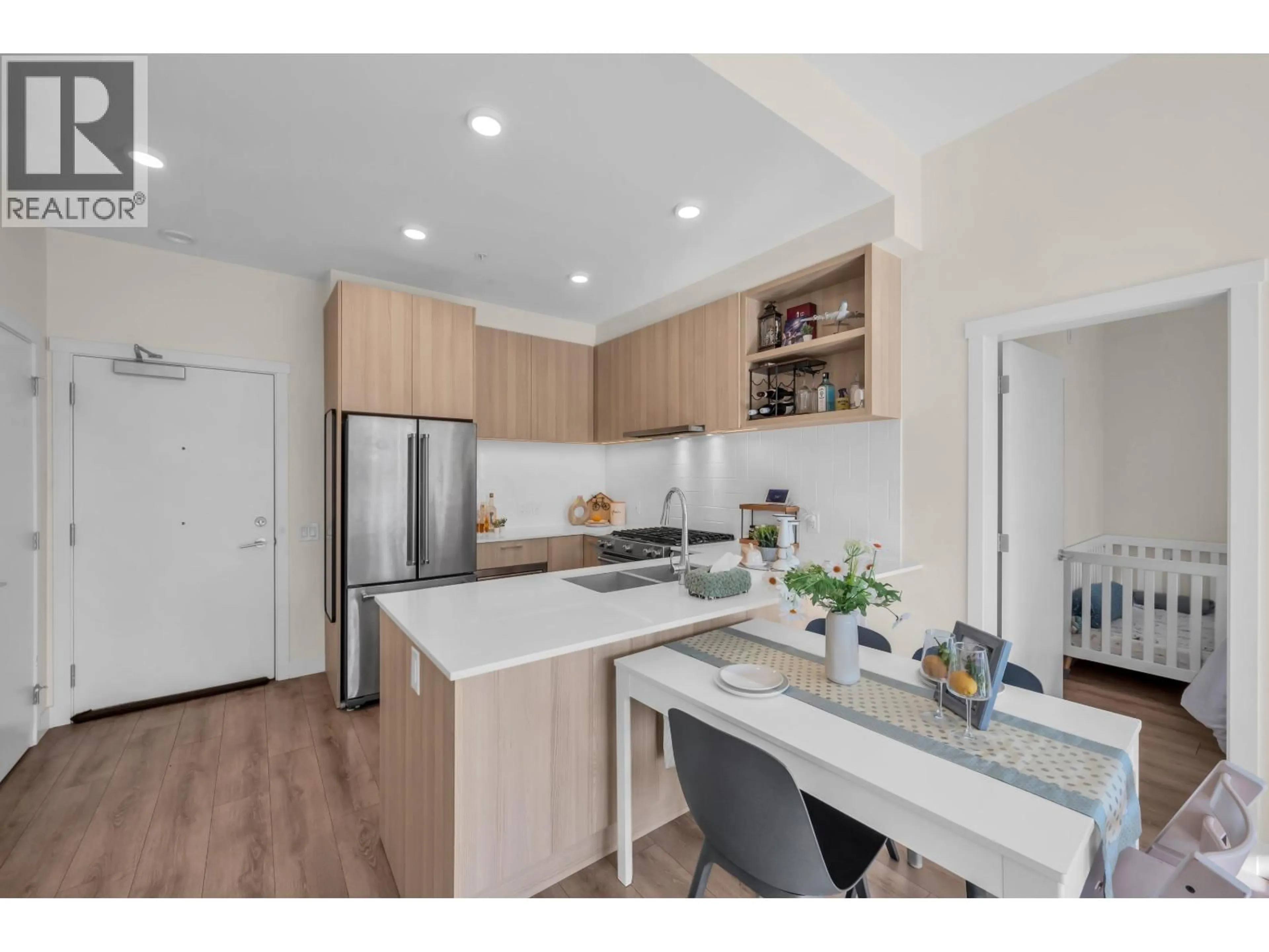 Open concept kitchen, wood/laminate floor for 402 - 721 ANSKAR COURT, Coquitlam British Columbia V3J0L4