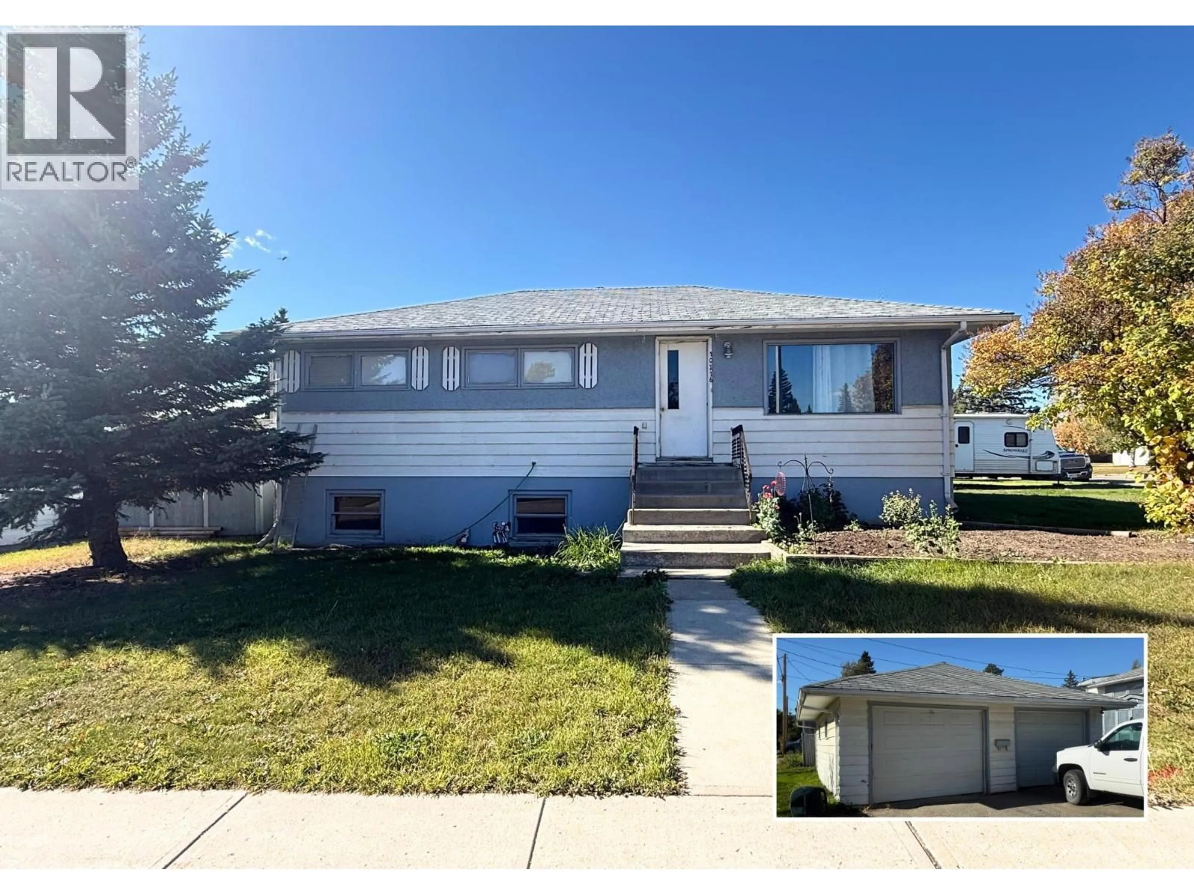 Home with vinyl exterior material, street for 10216 106 STREET, Fort St. John British Columbia V1J4E8