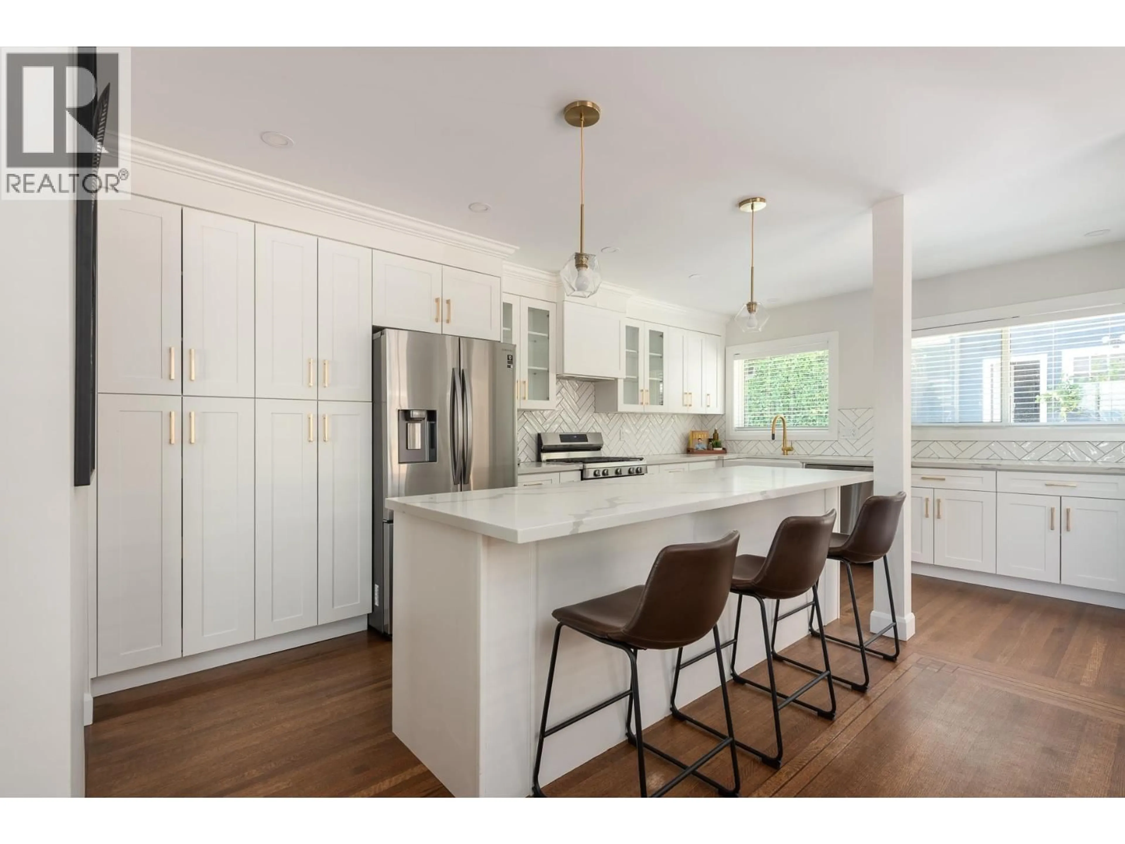 Open concept kitchen, wood/laminate floor for 205 DURHAM STREET, New Westminster British Columbia V3L4J2