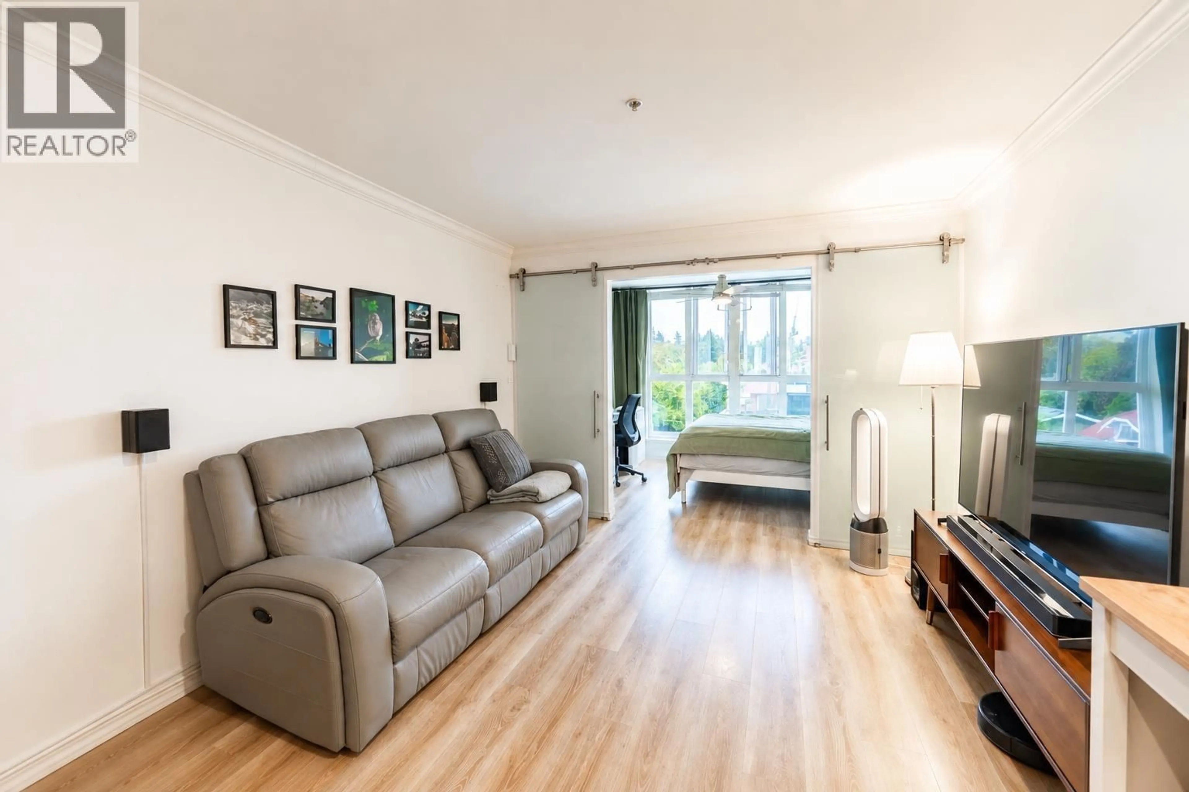 Living room with furniture, wood/laminate floor for 406 - 5629 DUNBAR STREET, Vancouver British Columbia V6N1W5