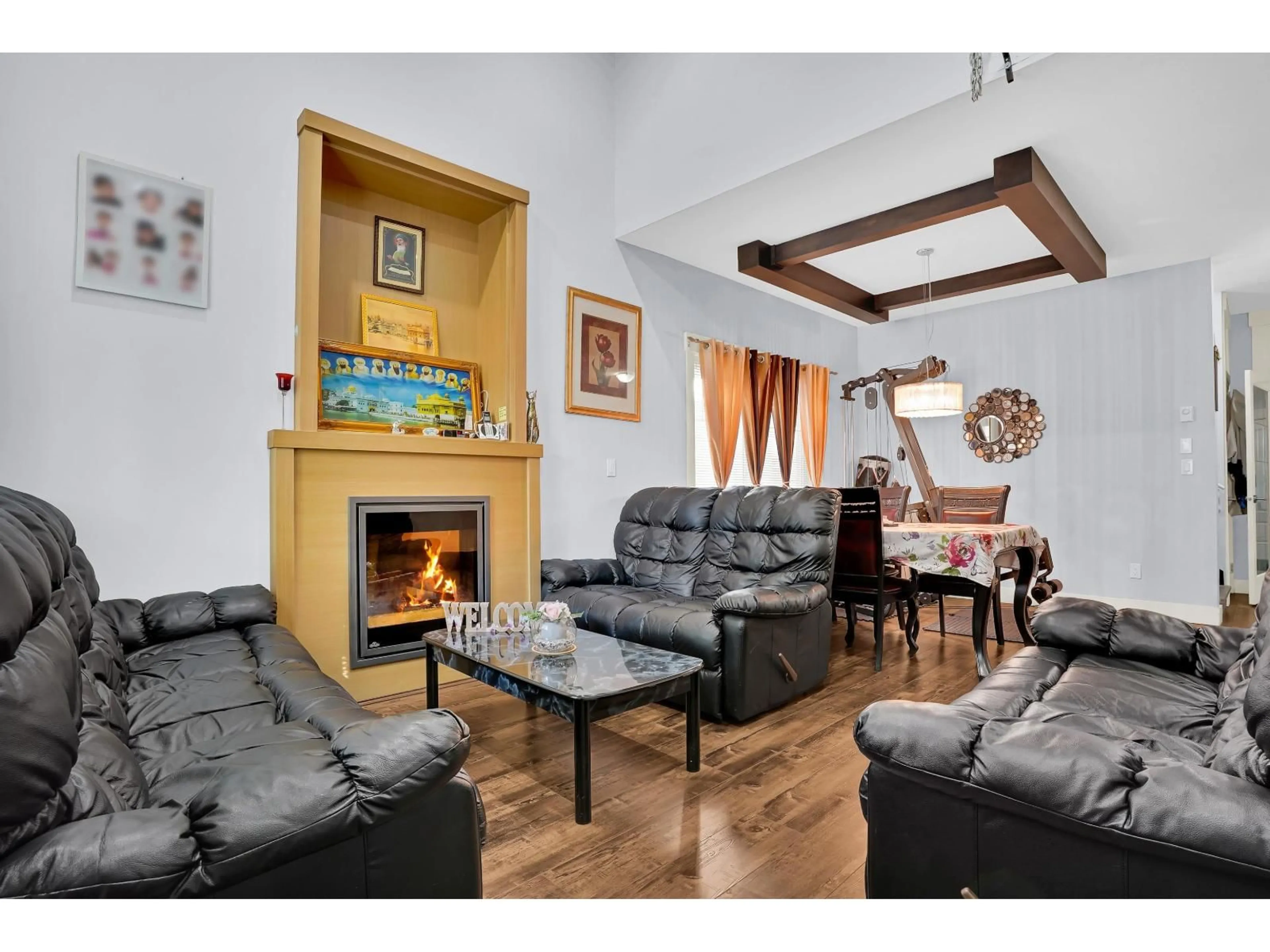 Living room with furniture, wood/laminate floor for 7 - 30748 CARDINAL AVENUE, Abbotsford British Columbia V2T0C1