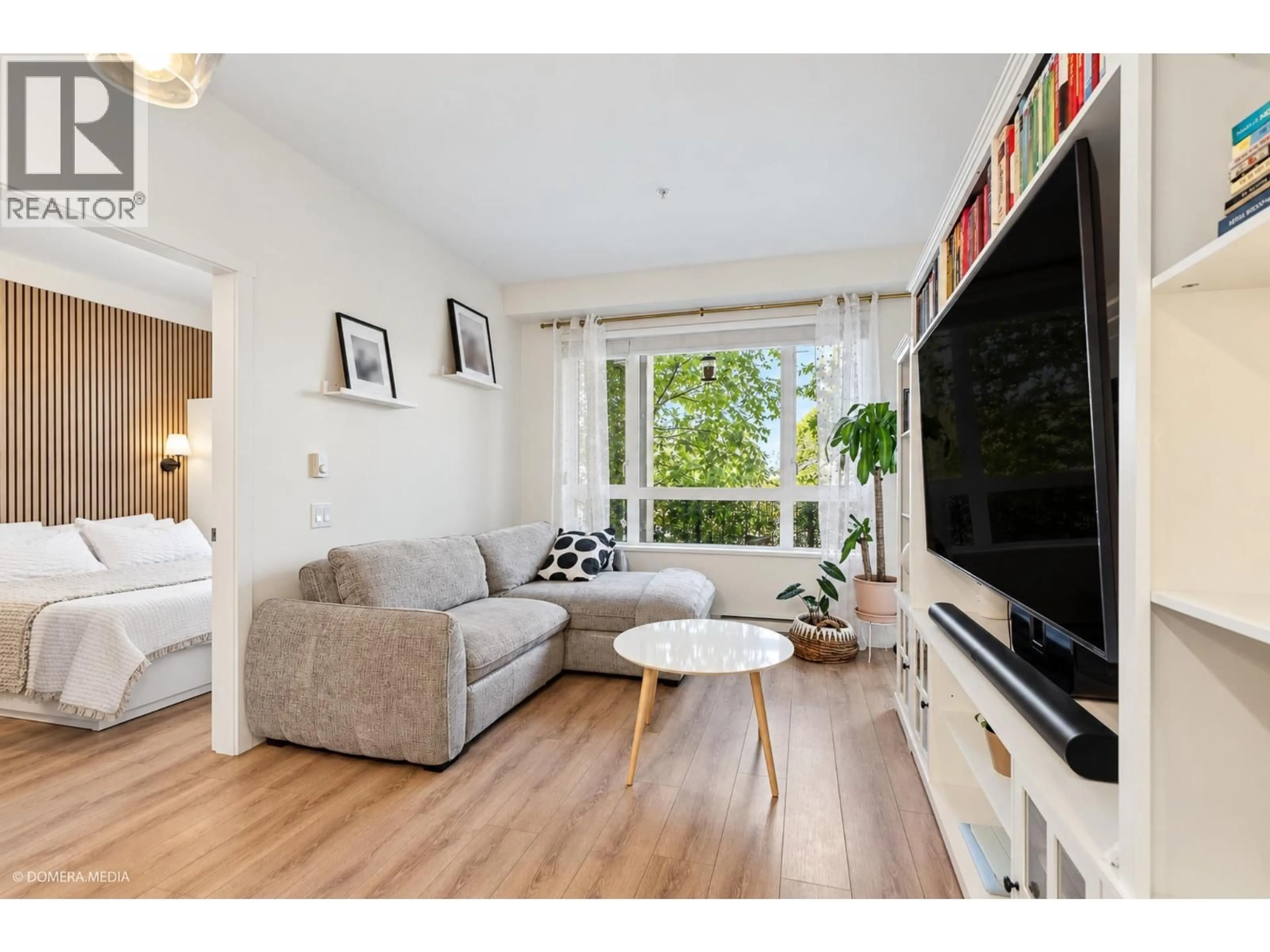Living room with furniture, wood/laminate floor for 110 - 721 ANSKAR COURT, Coquitlam British Columbia V3J0L4