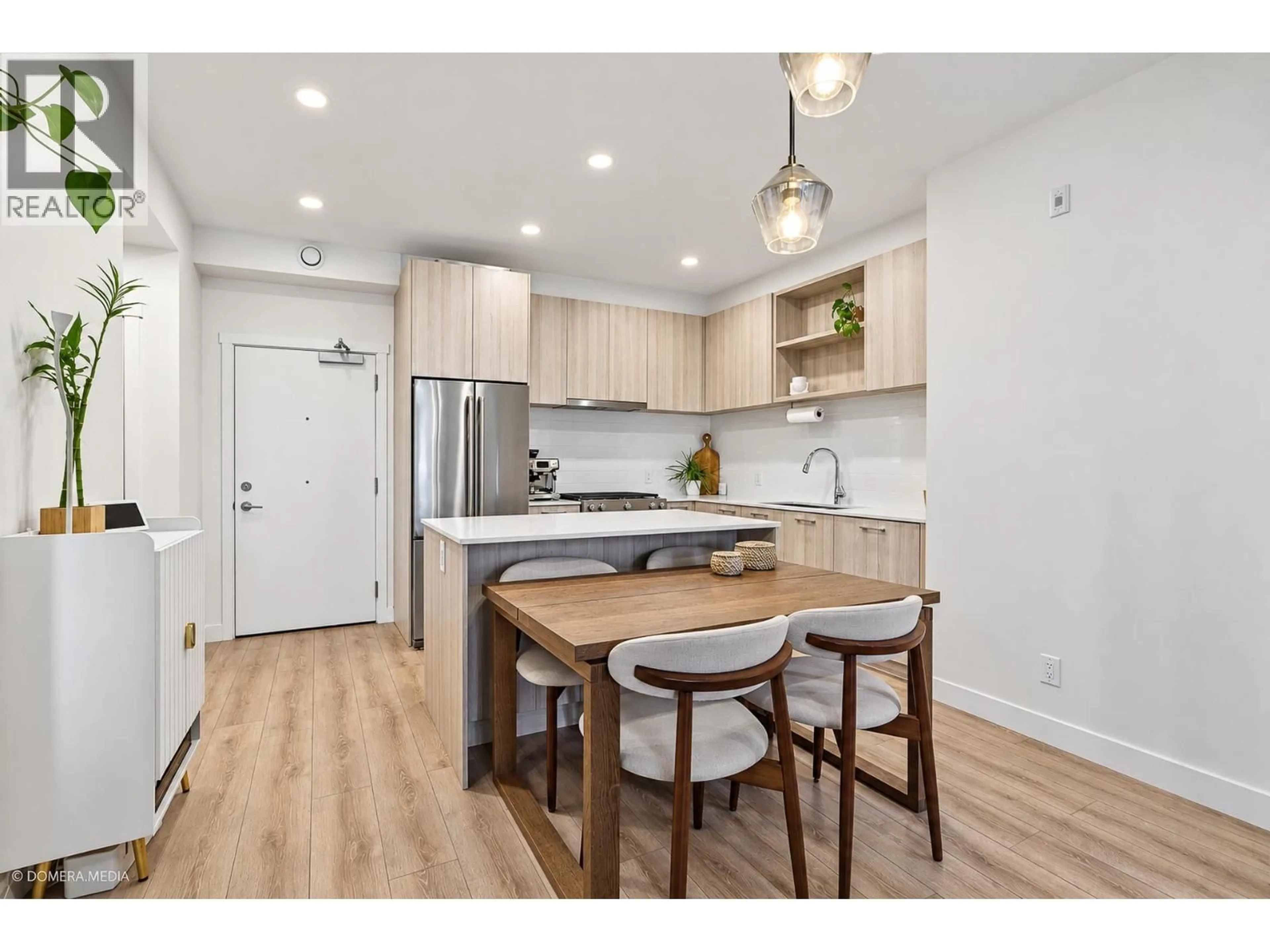 Open concept kitchen, wood/laminate floor for 110 - 721 ANSKAR COURT, Coquitlam British Columbia V3J0L4